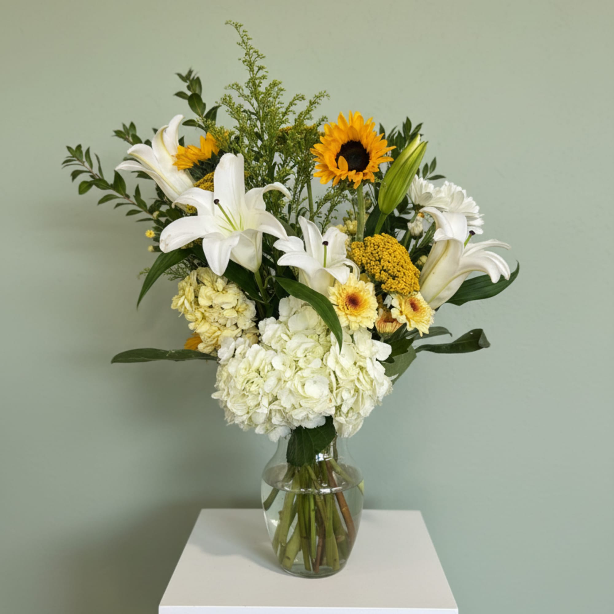 Send the gift of friendship and beautiful blooms with this delicate and