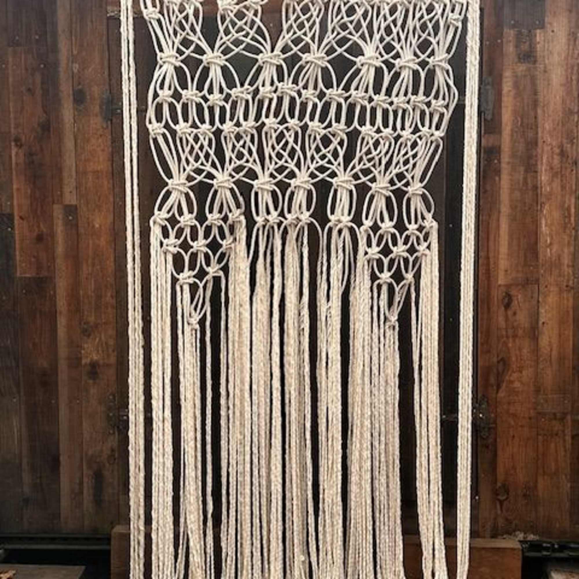 One of a kind piece. 
Stunning, oversized macram&eacute; wall hanging, handcrafted with