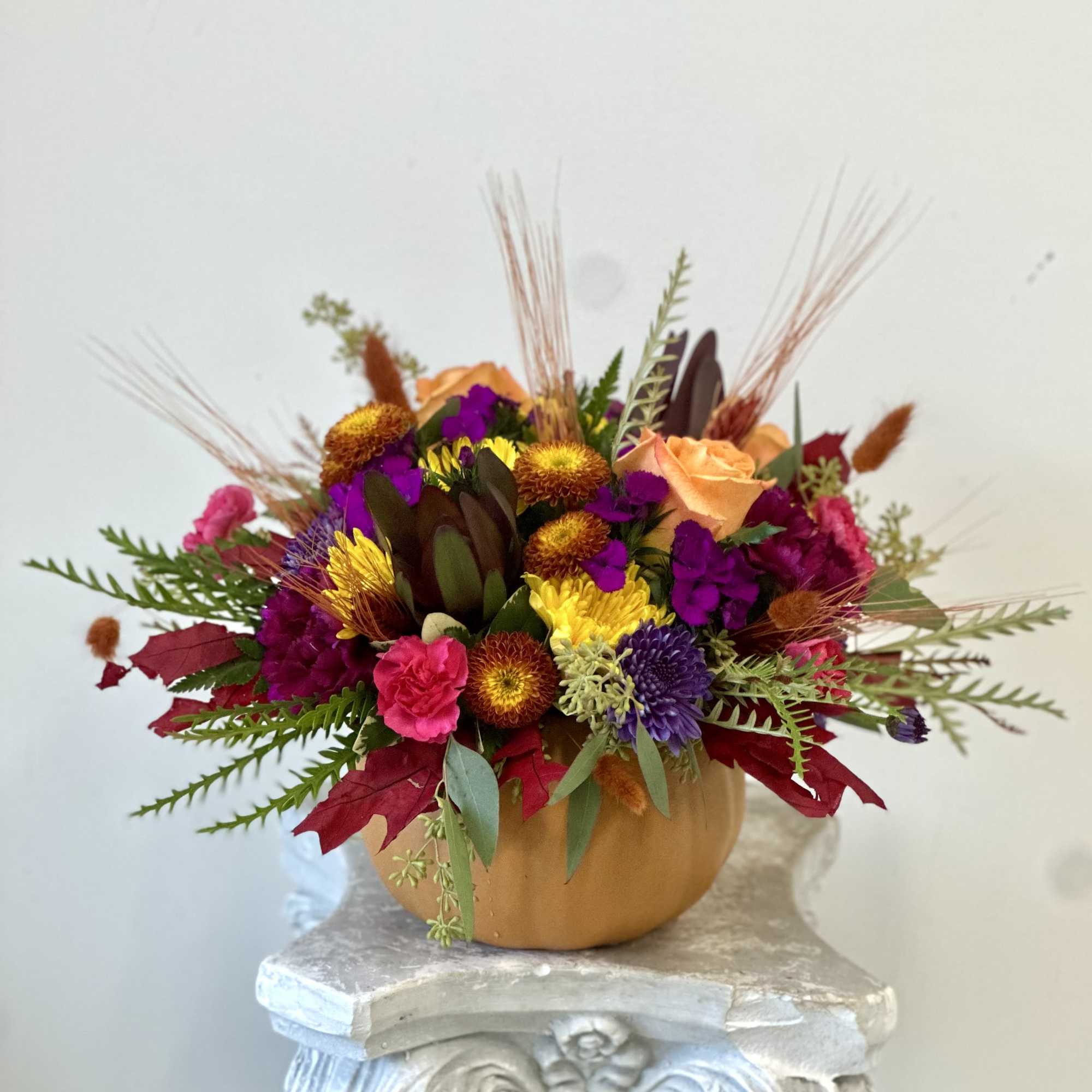 Embrace the warmth of autumn with Fall Fiesta by Westford Florist Art