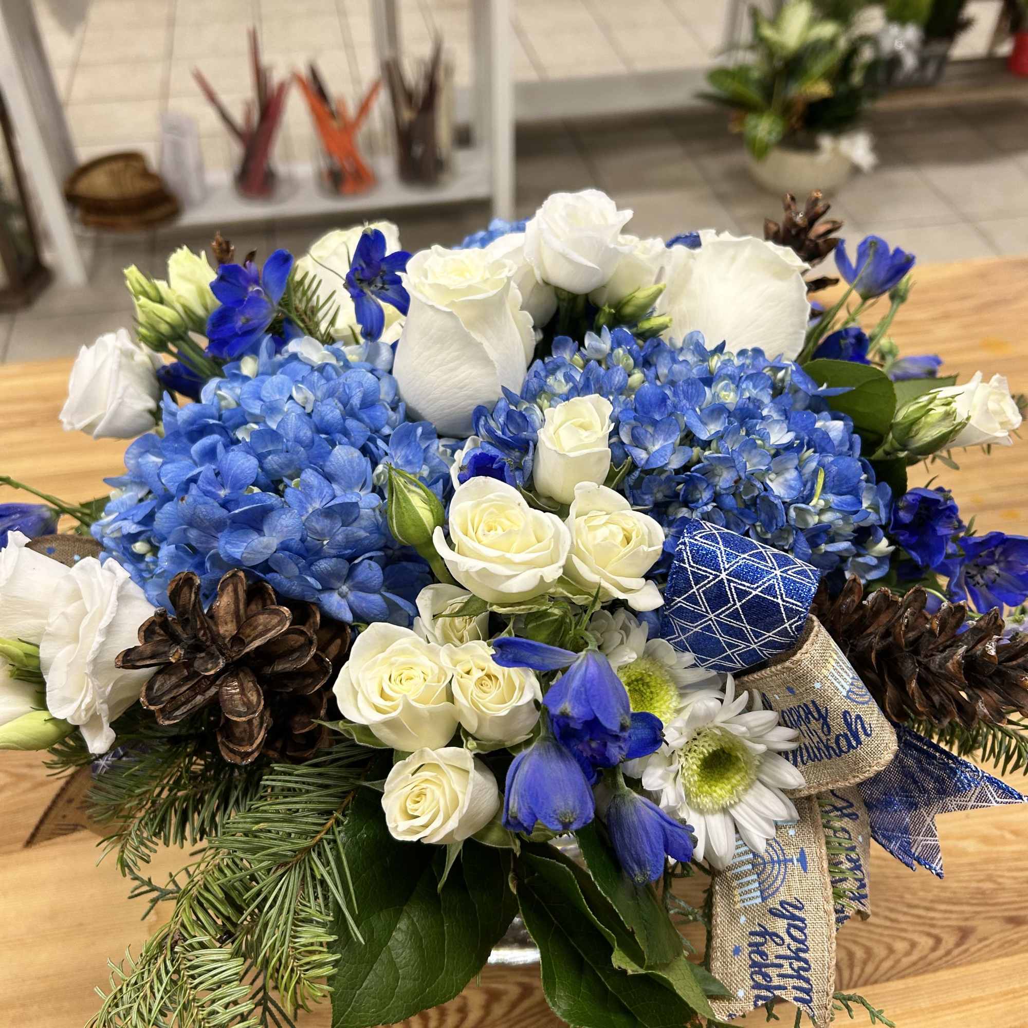 Celebrate the magic of Hanukkah with our enchanting arrangement, Hanukkah Harmony by