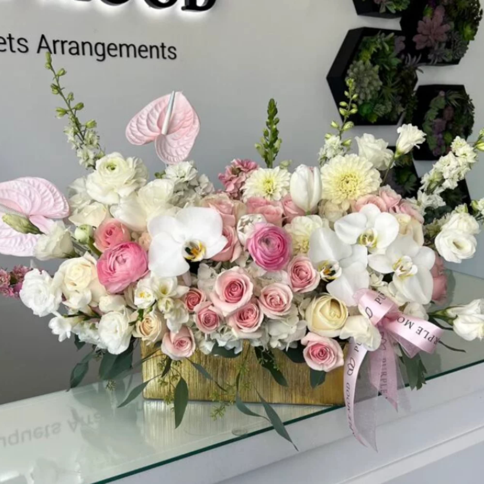 Rectangular Vase
Elegant and refined, the Rectangular Vase arrangement is designed to impress