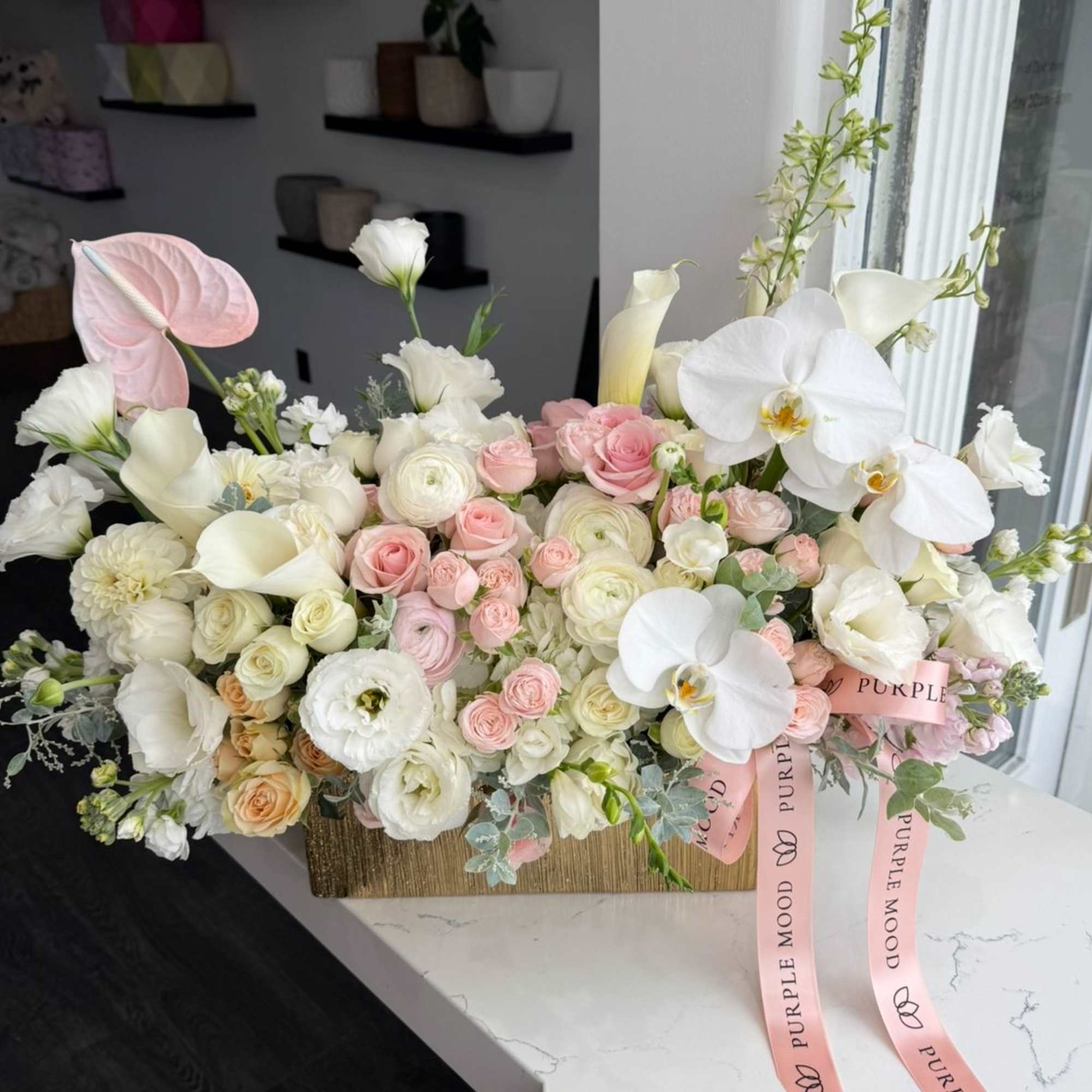 Rectangular Vase
Elegant and refined, the Rectangular Vase arrangement is designed to impress