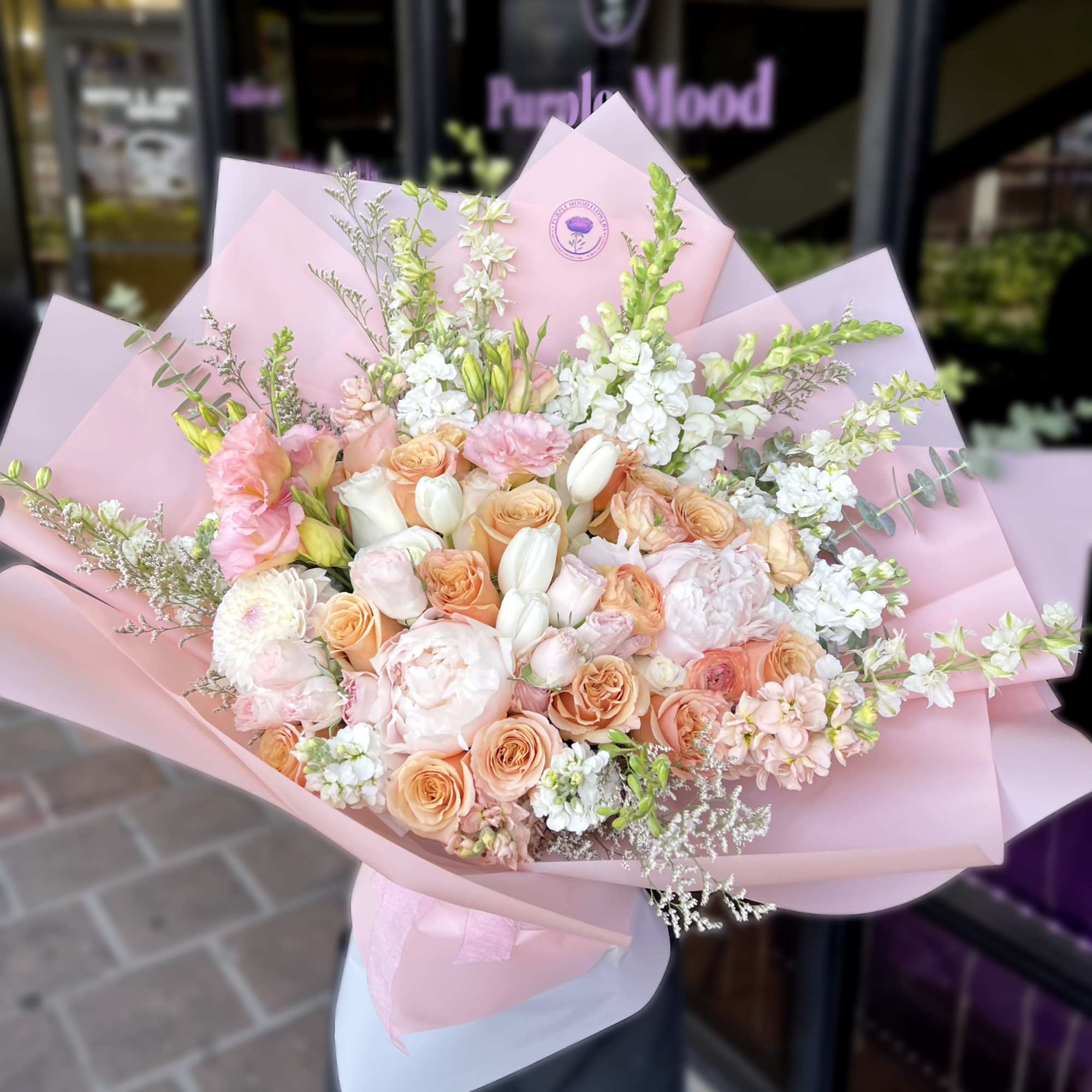 Bright, cheerful, and full of warmth &mdash; the Peachy Peach bouquet is