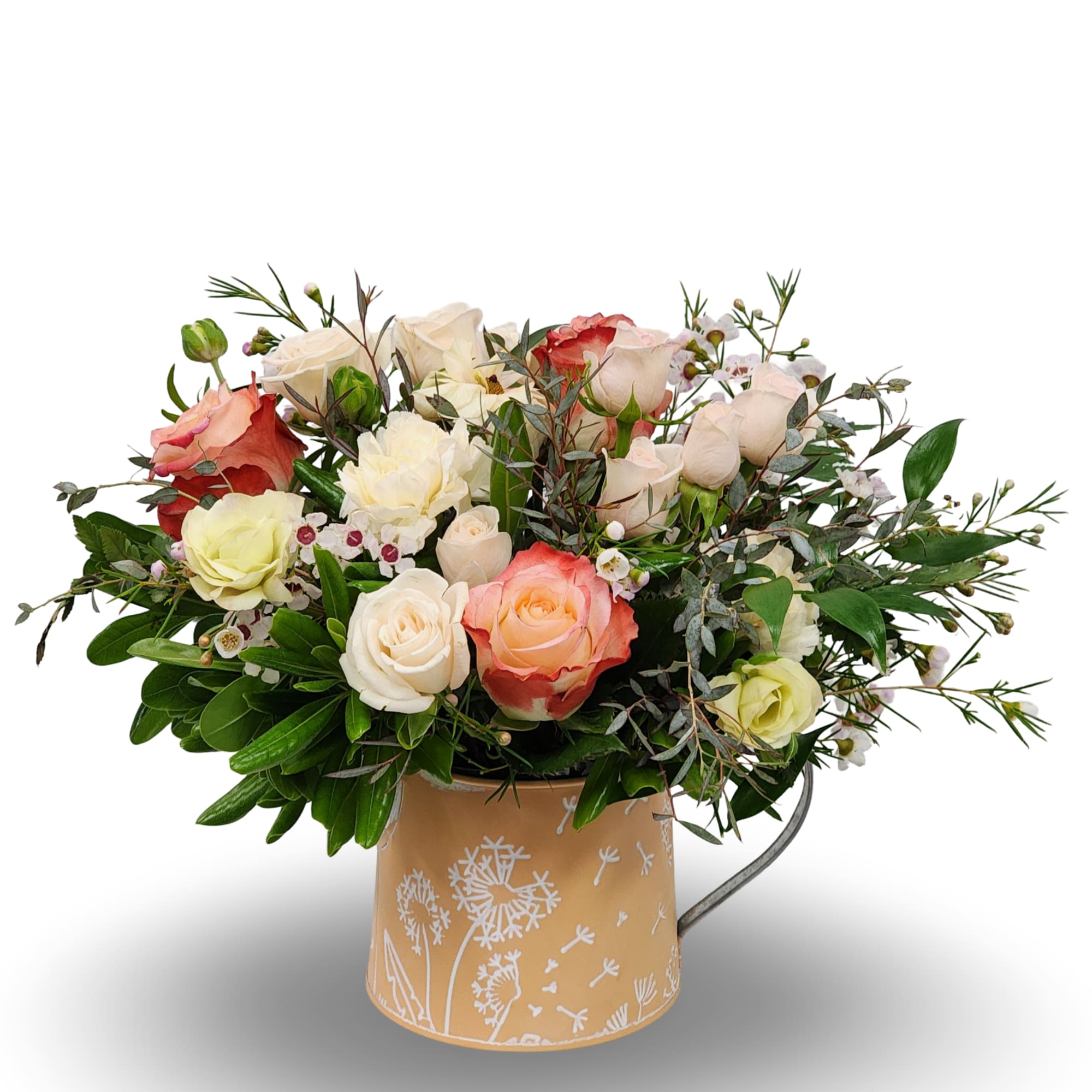 A beautiful, seasonal arrangement with hints of peach and a mixture of