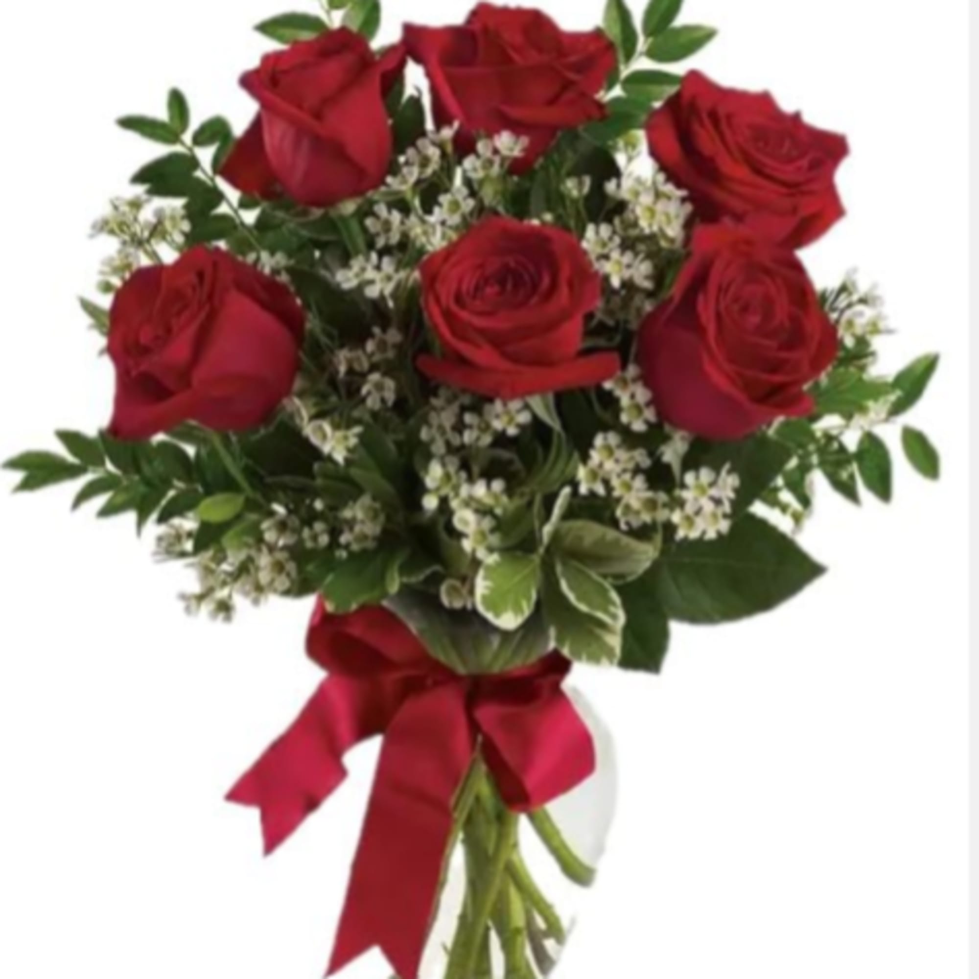 Rich red roses, clustered upright with soft white filler blooms, create a