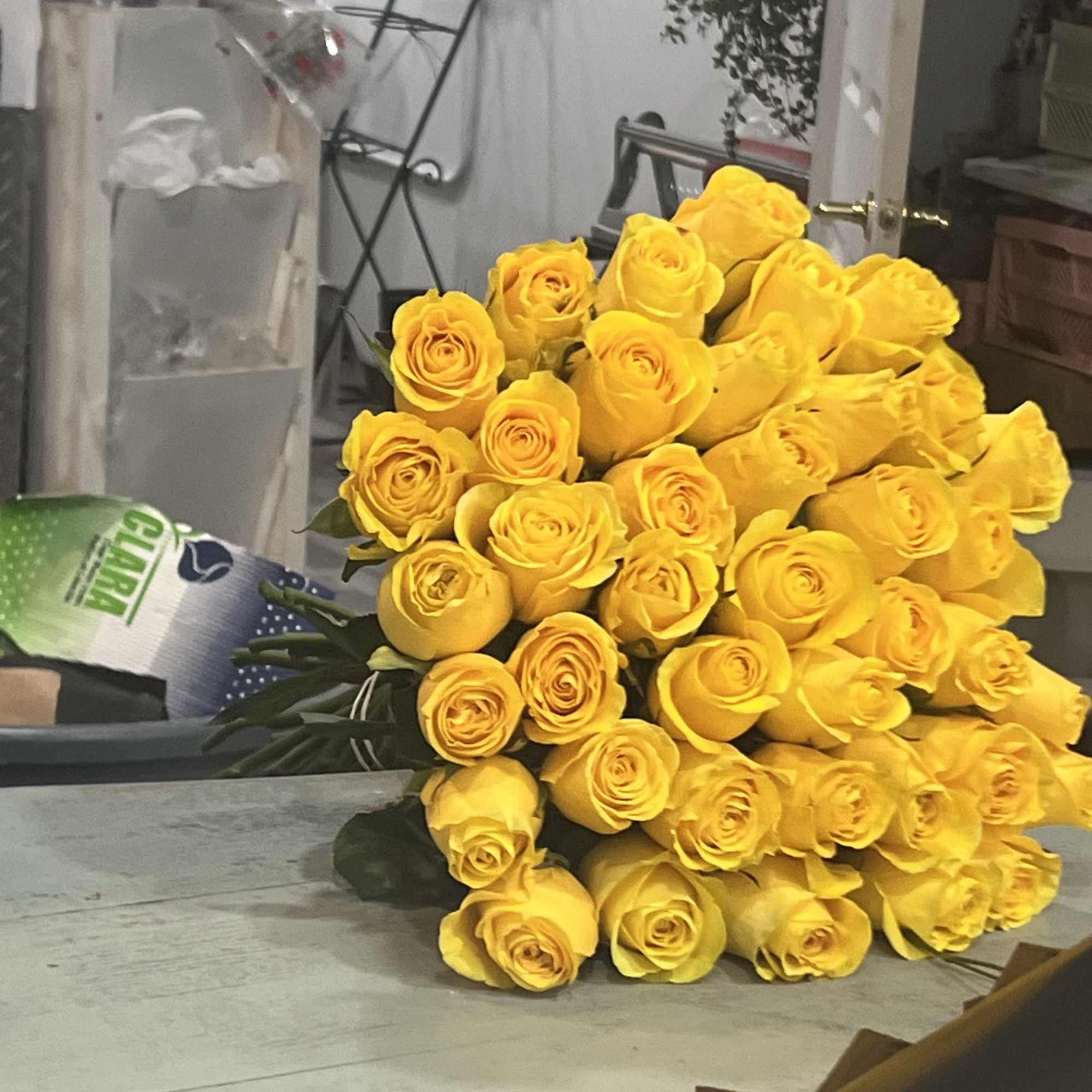 Bouquet pink and white 24 stems of roses .