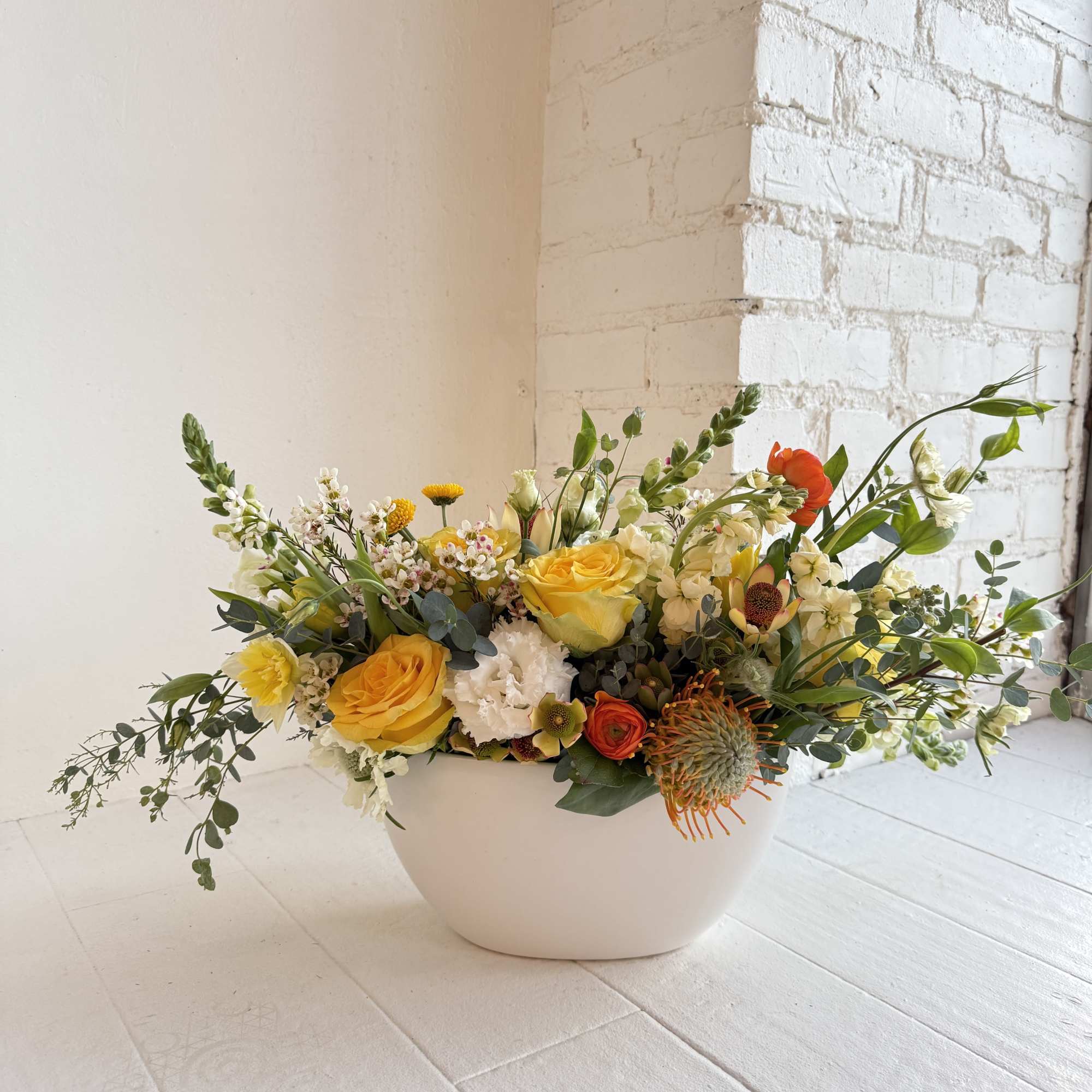 Clementine is stunning. We start with a white ceramic long low container