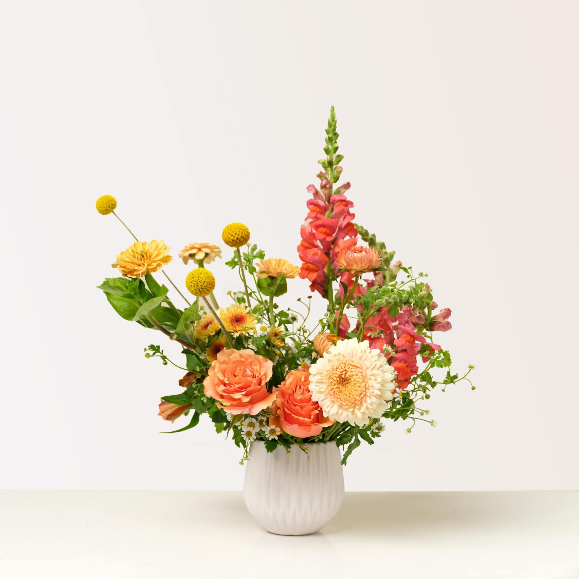 Pretty lovely flowers! This arrangement will brighten anyone's day. We artfully arrange