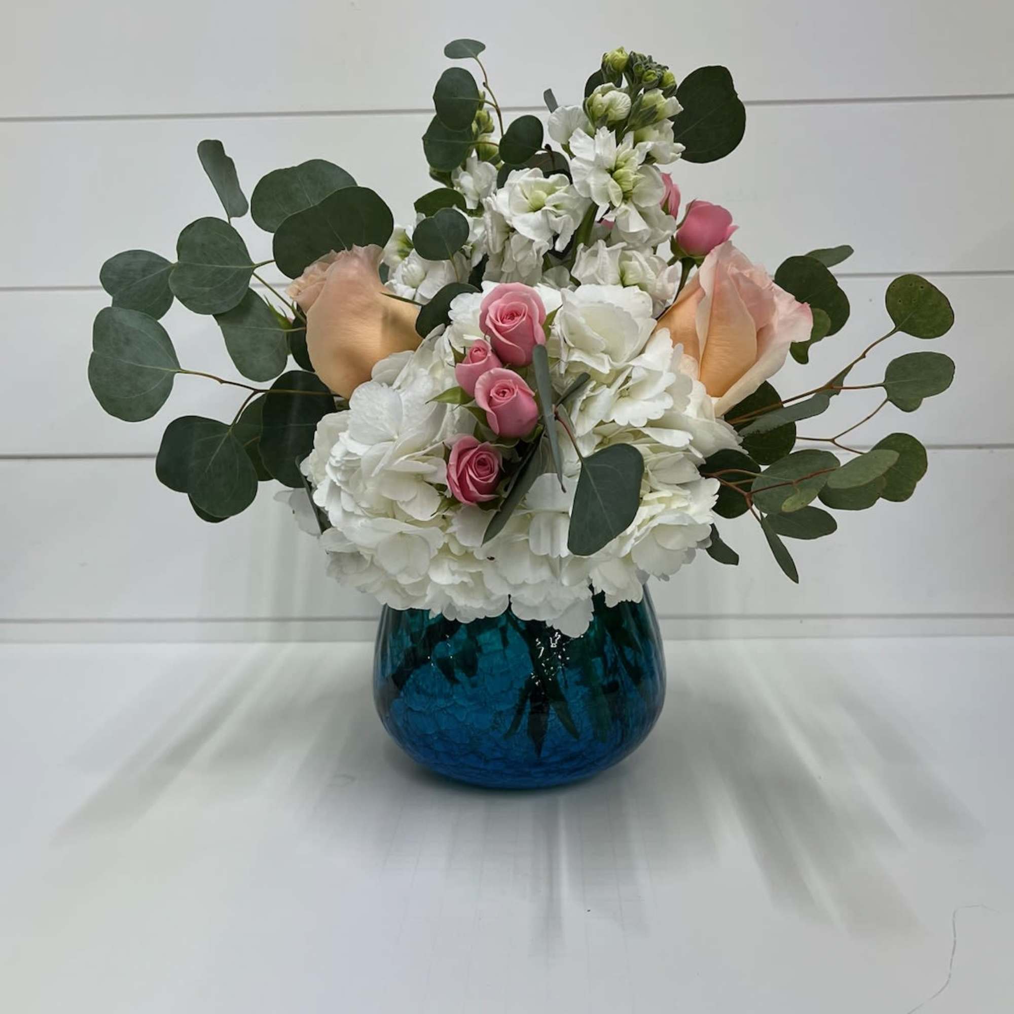 Celebrate the softness of the season with Gentle Spring, a graceful floral