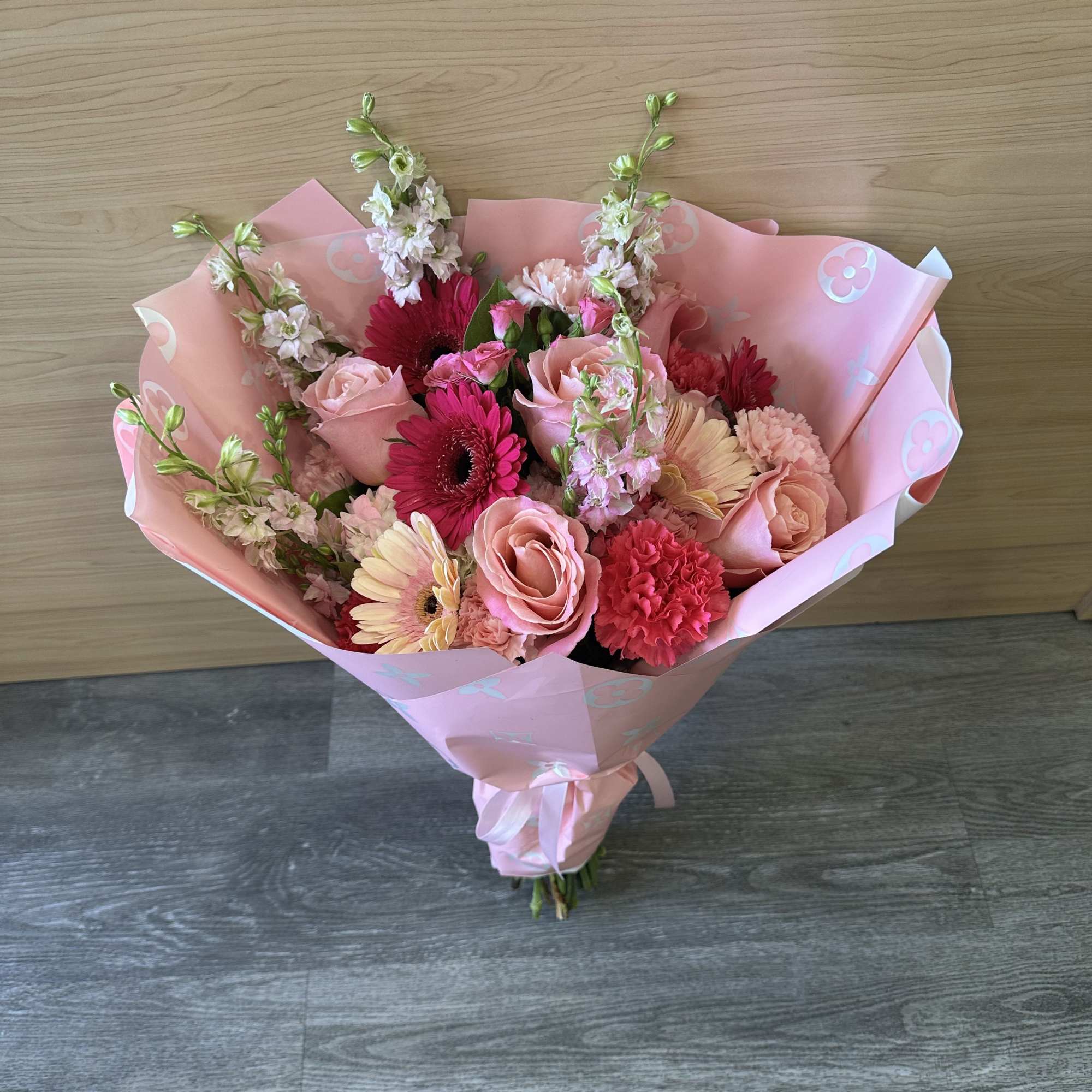 Our professional florists have put together a wrap bouquet of flowers that