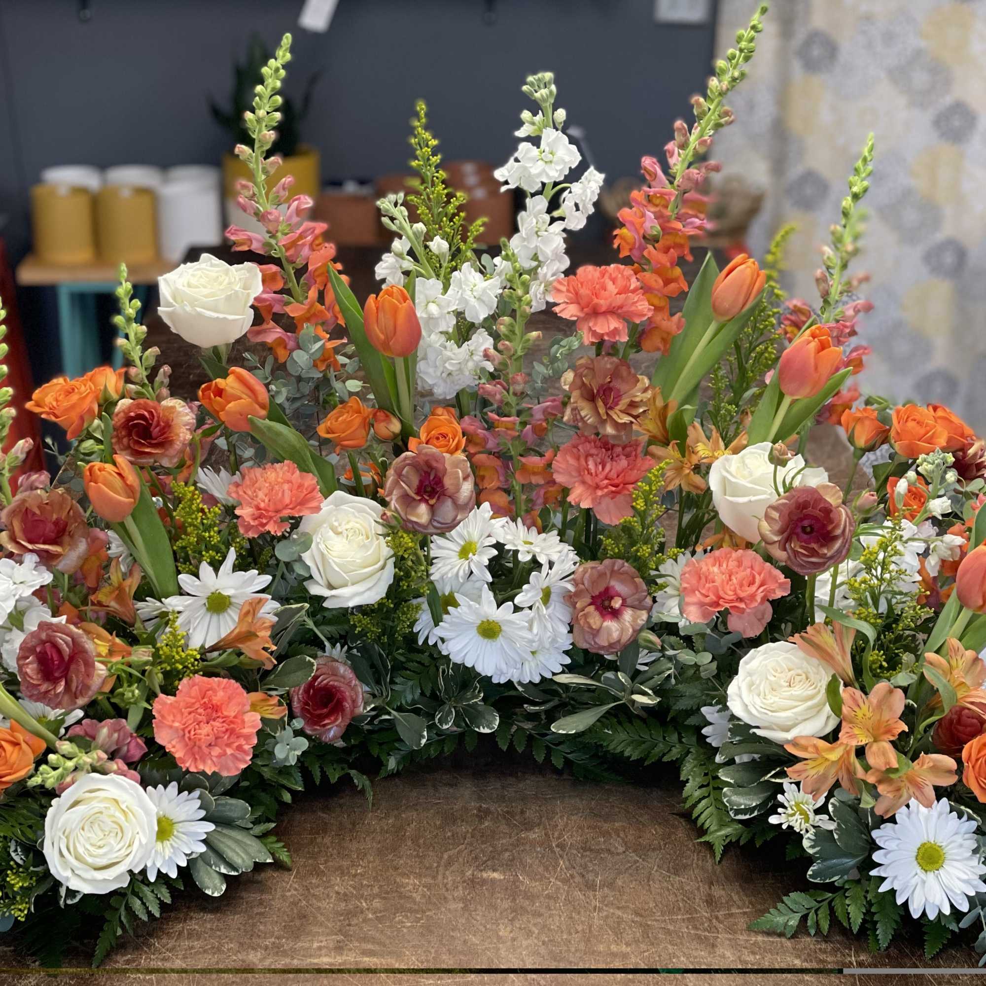 Pay tribute to your loved one with a beautiful floral presentation to