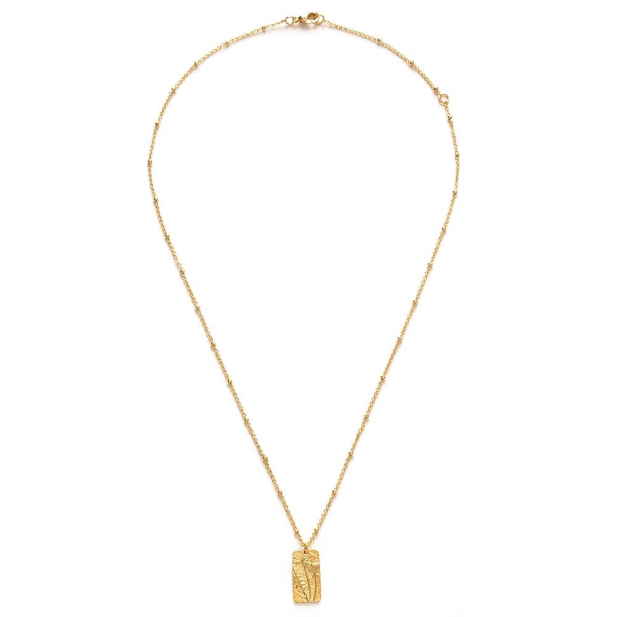 This beautiful flower medallion layers beautifully or is a sweet, simple statement