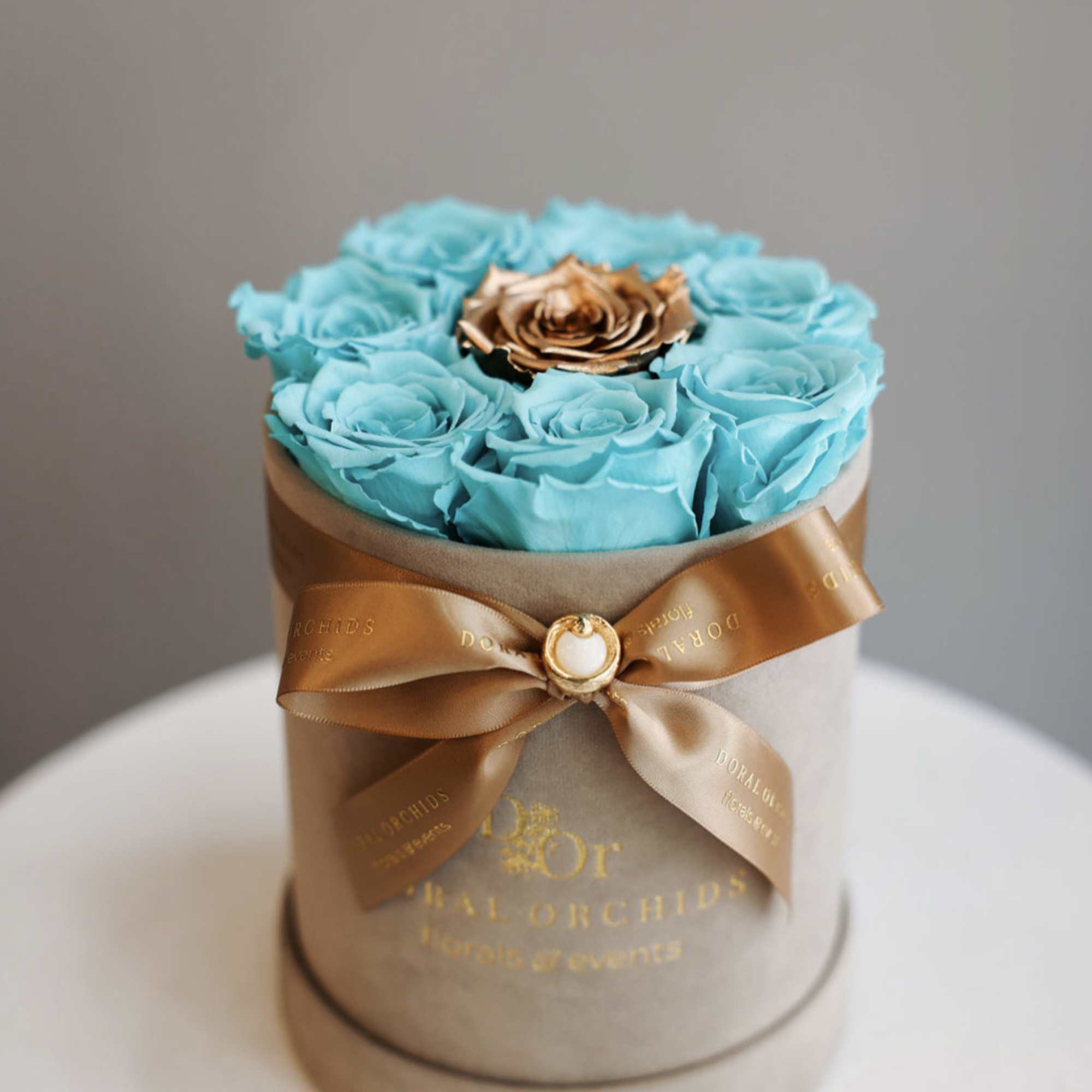 Vivid aqua preserved roses designed to last 3 or more years form