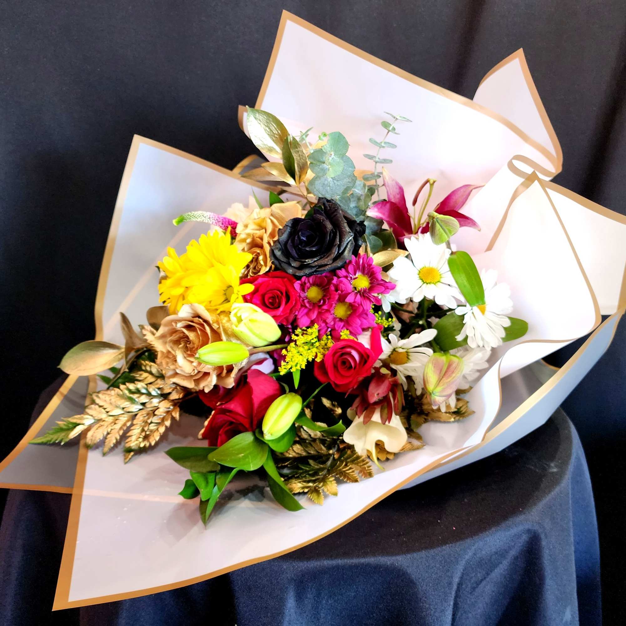 When you have enough vases at home....send a wrapped bouquet of seasonal