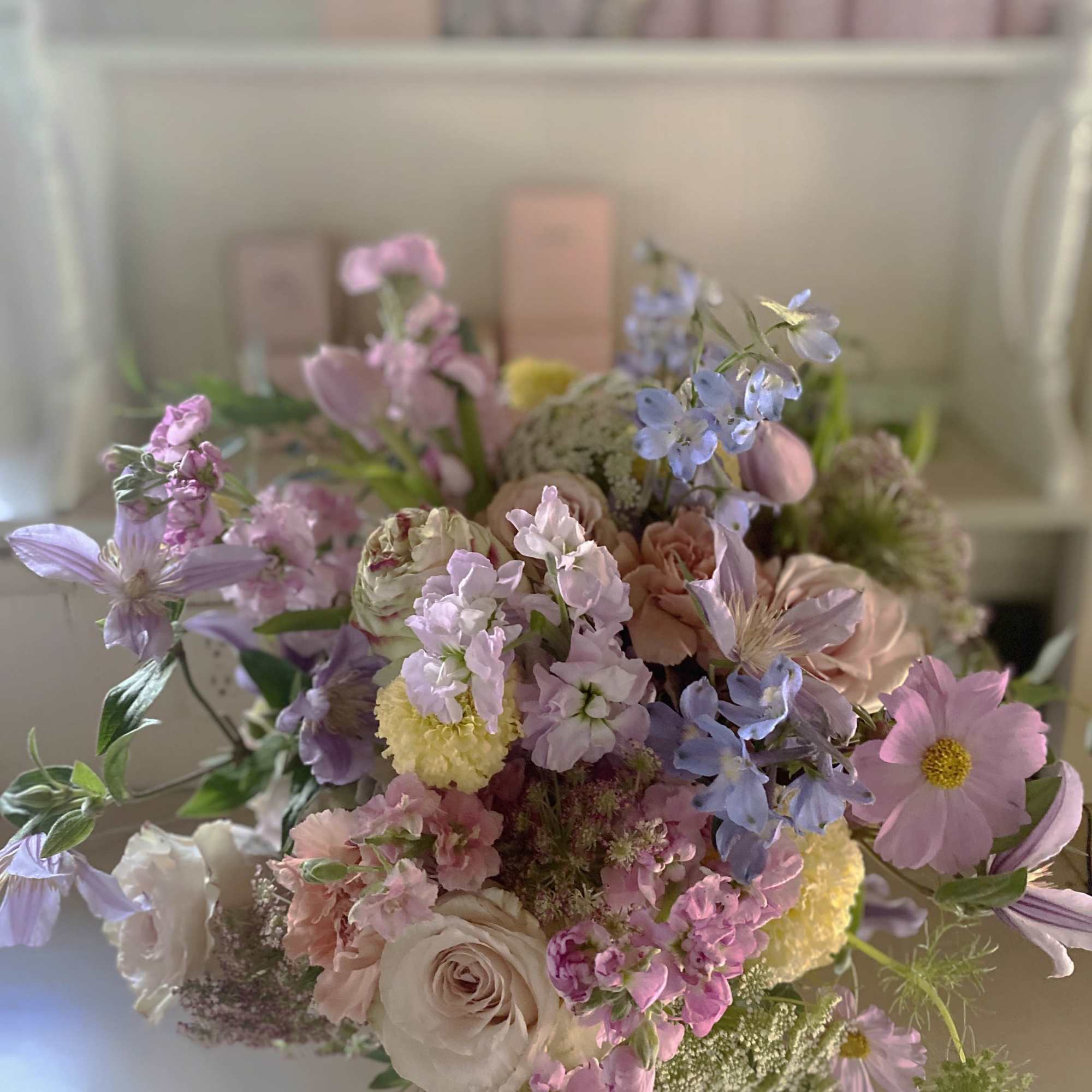 Lovely handtied bouquet, a bundle of natural seasonal stems in fresh astel