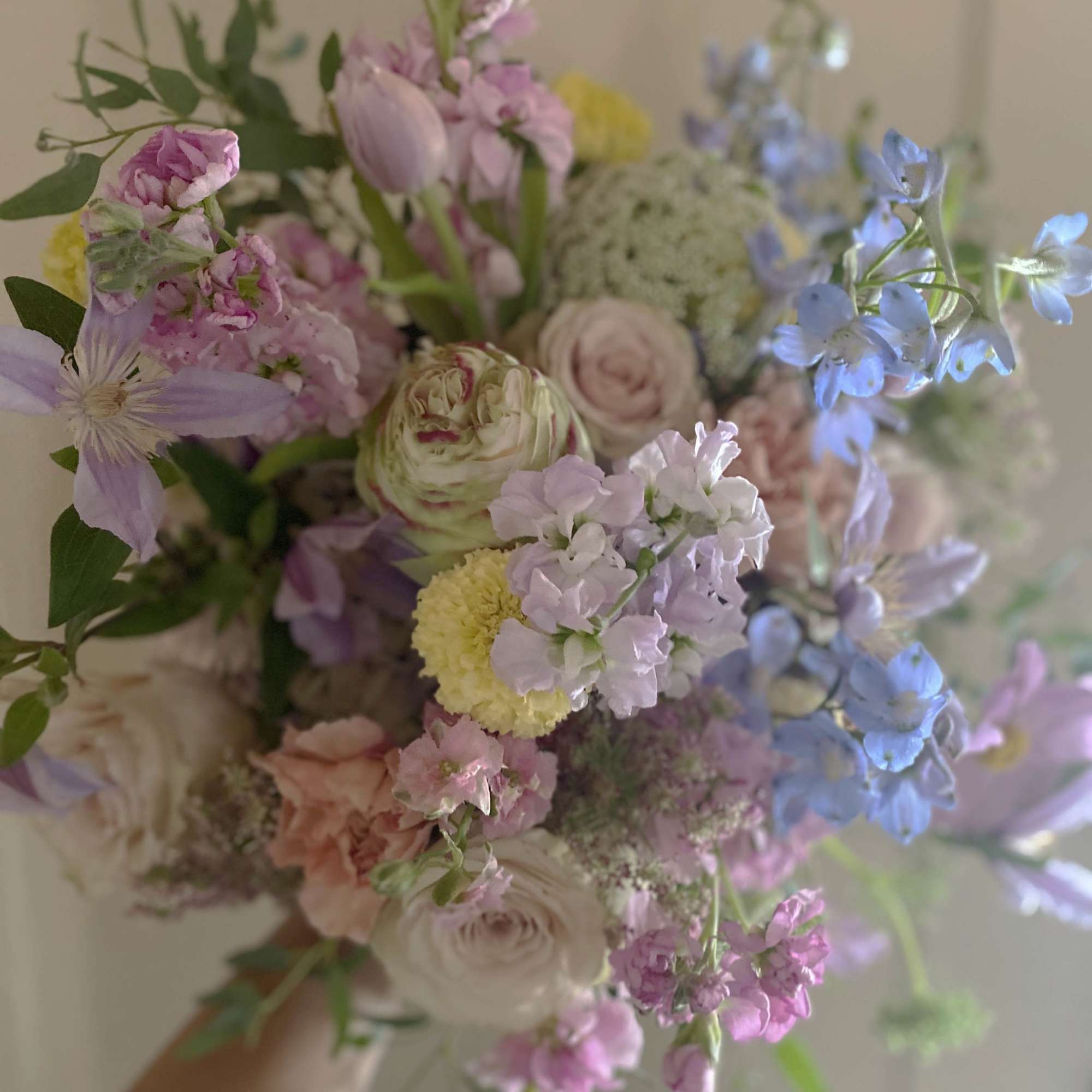 Lovely handtied bouquet, a bundle of natural seasonal stems in fresh astel