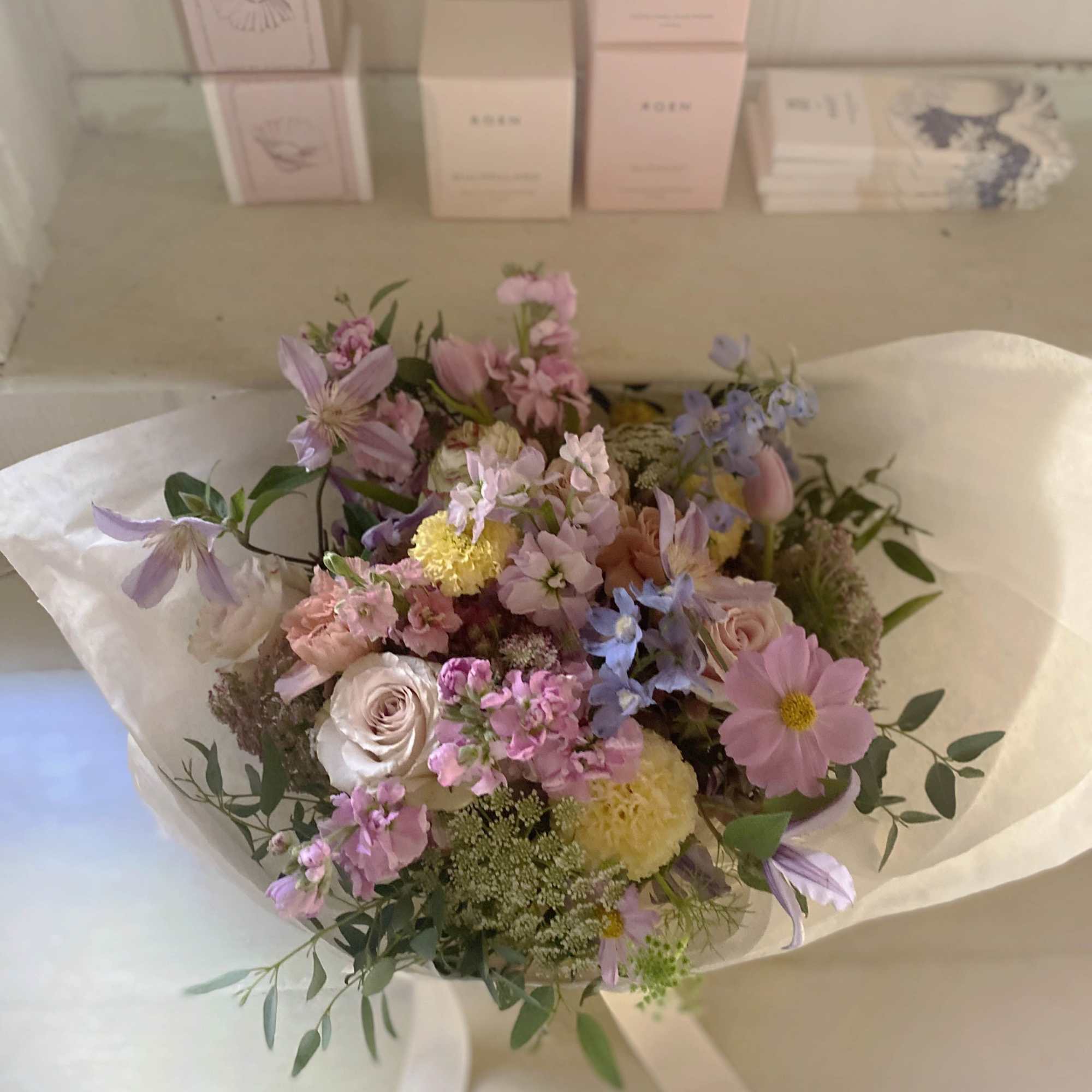 Lovely handtied bouquet, a bundle of natural seasonal stems in fresh astel