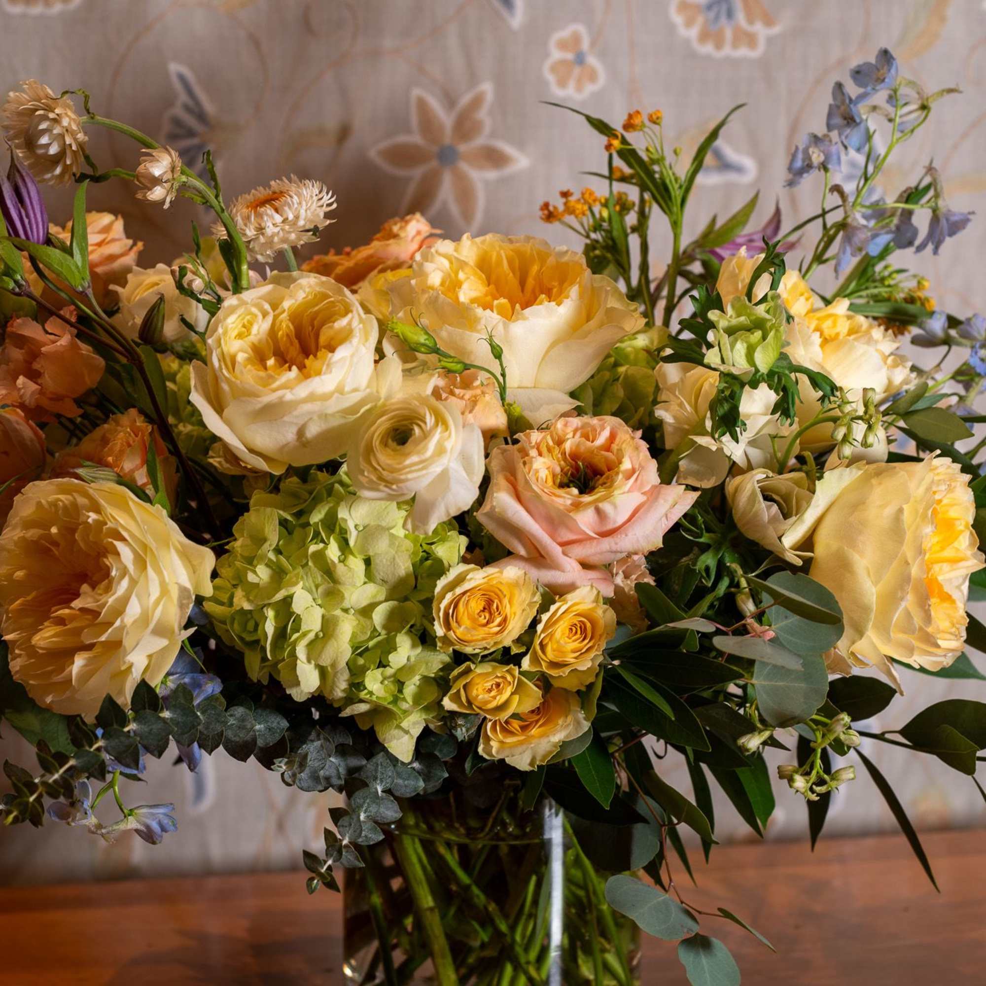 Beautiful roses and floral material in different shades of yellows. 