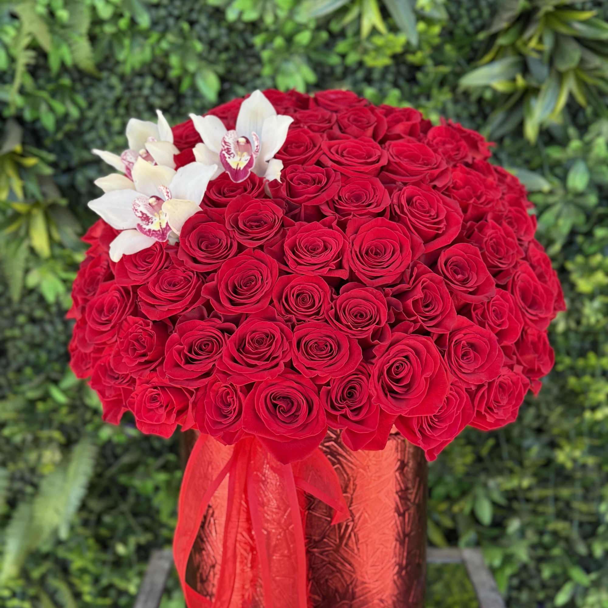 A bright and cheerful arrangement of red , inspired by the beauty