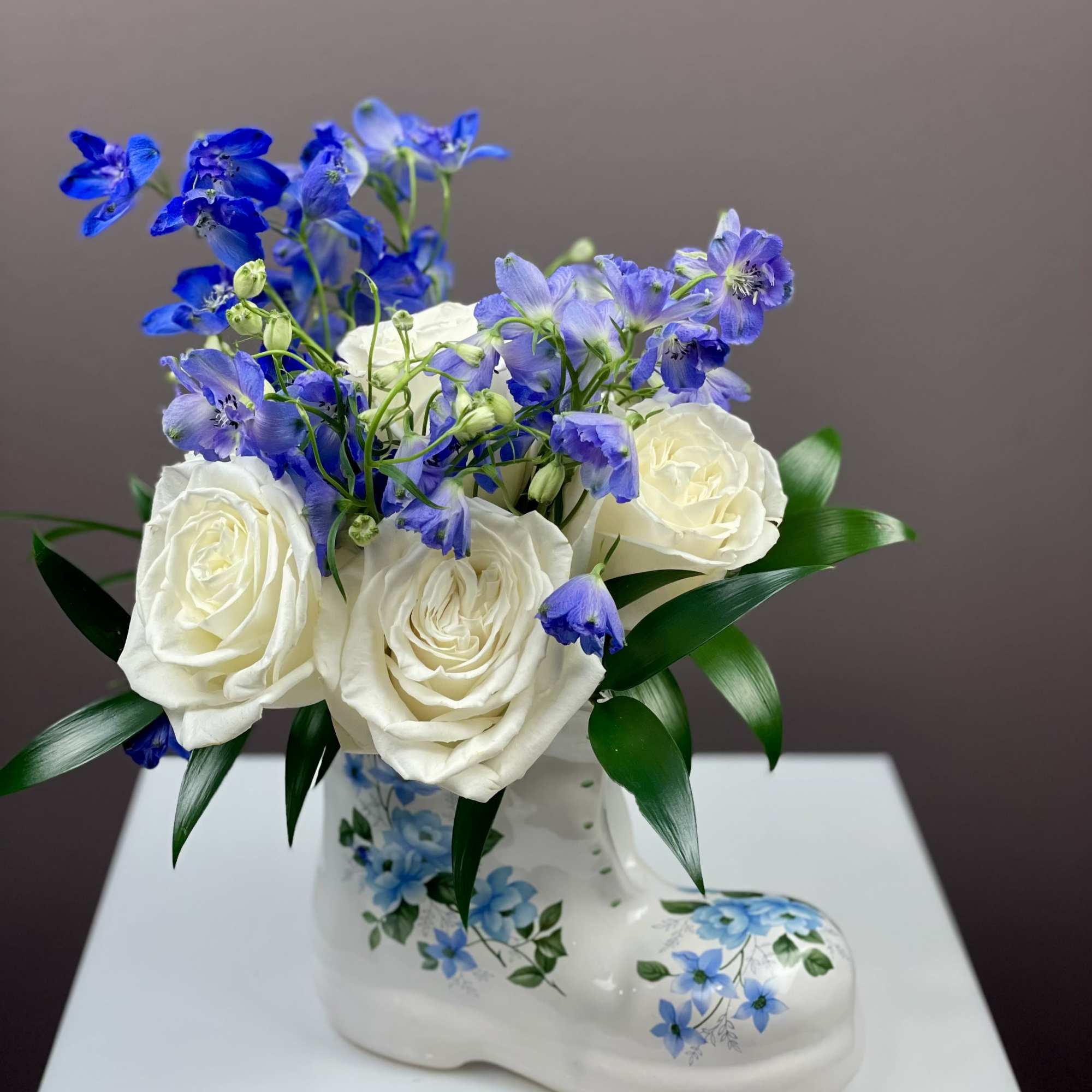 Step into elegance with this striking and whimsical floral treasure! Our Sapphire