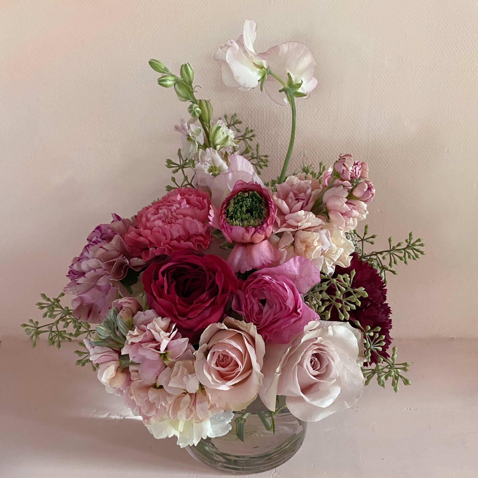 Adorable arrangement of all the Valentines love colors and flowers. Sweetpeas, roses