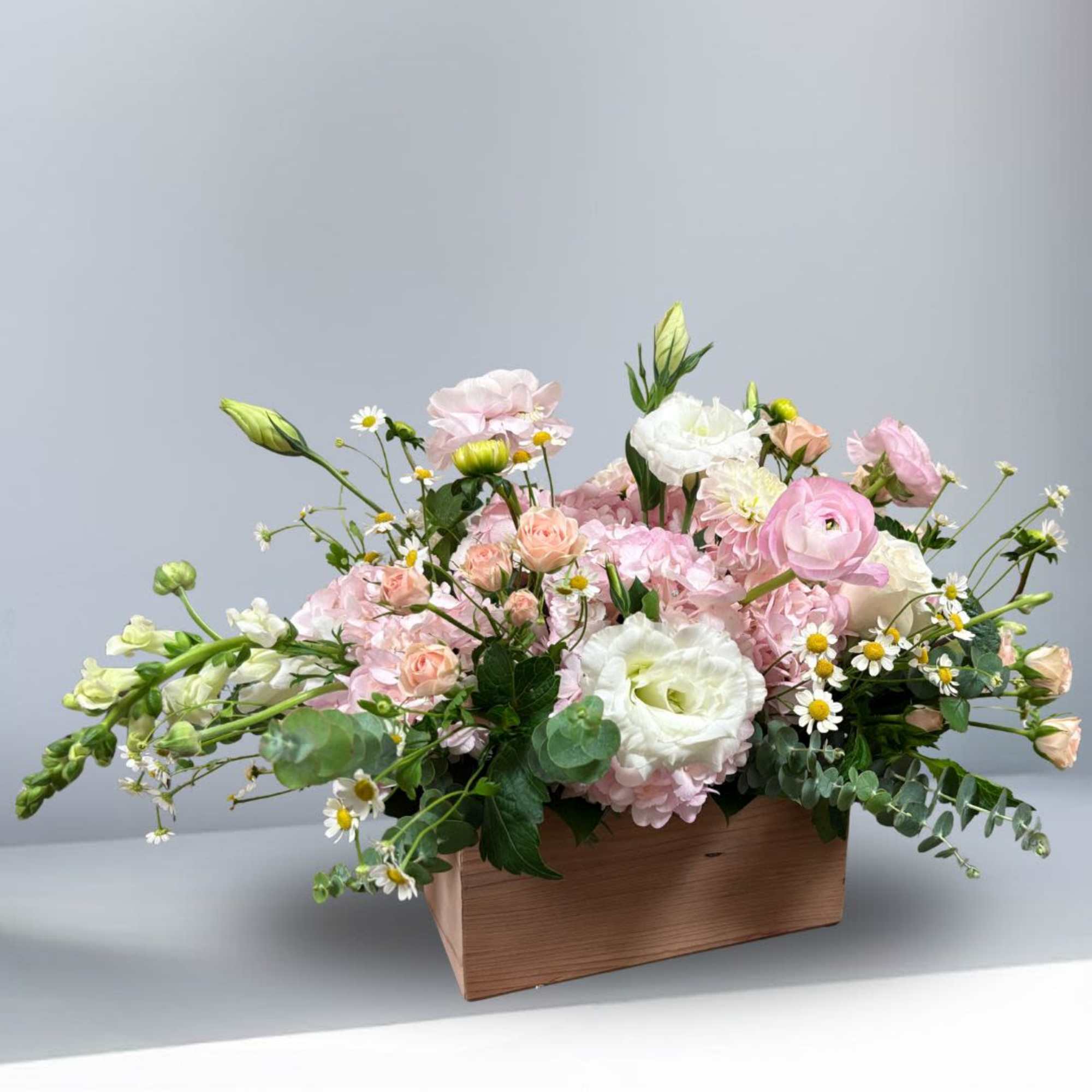 Recipe: Hydragaes, Snapdragon, Lisianthus, Roses, Baby Breath, Greens in a local hand-made