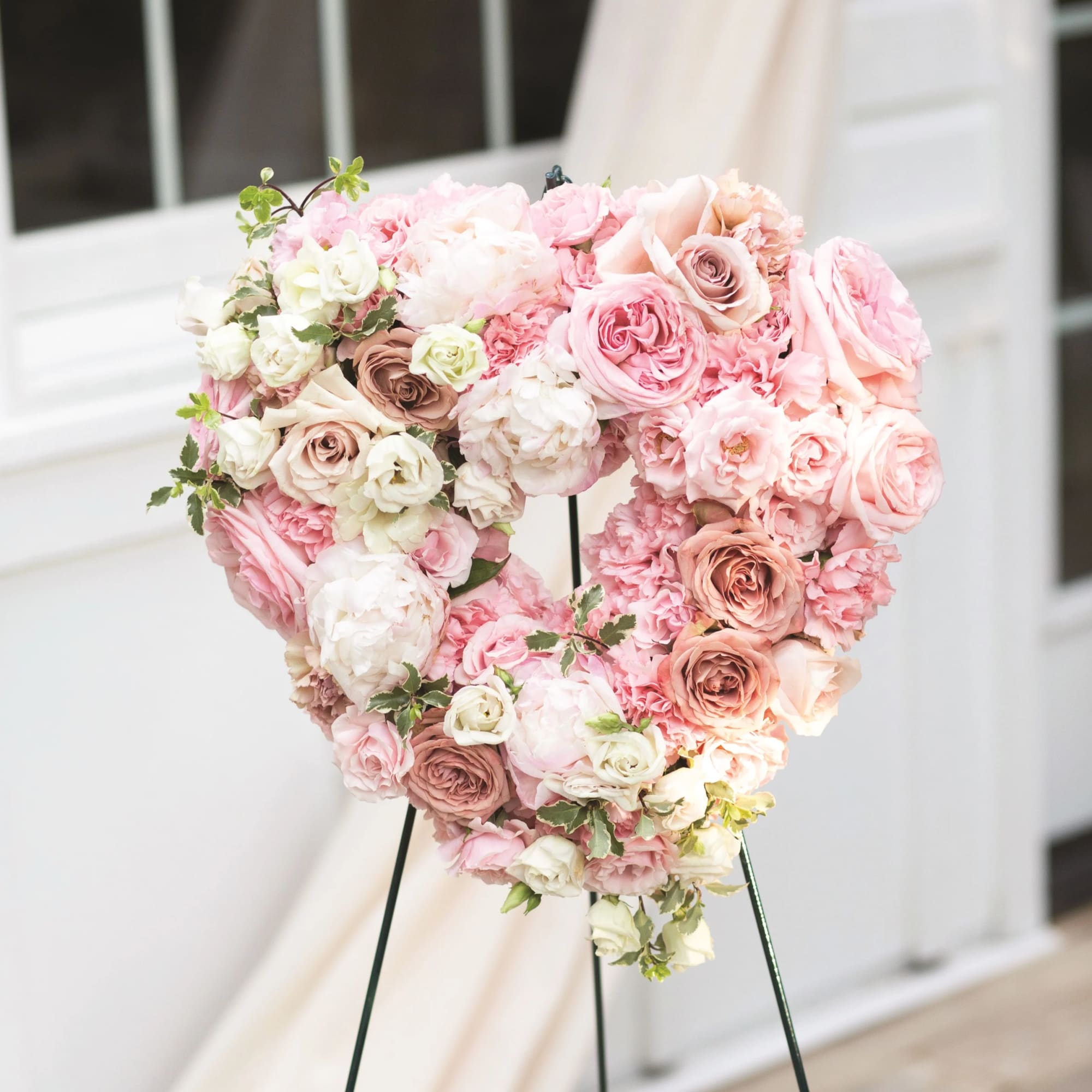 Elegant and heartfelt, Blush Heart Tribute is a floral expression of love