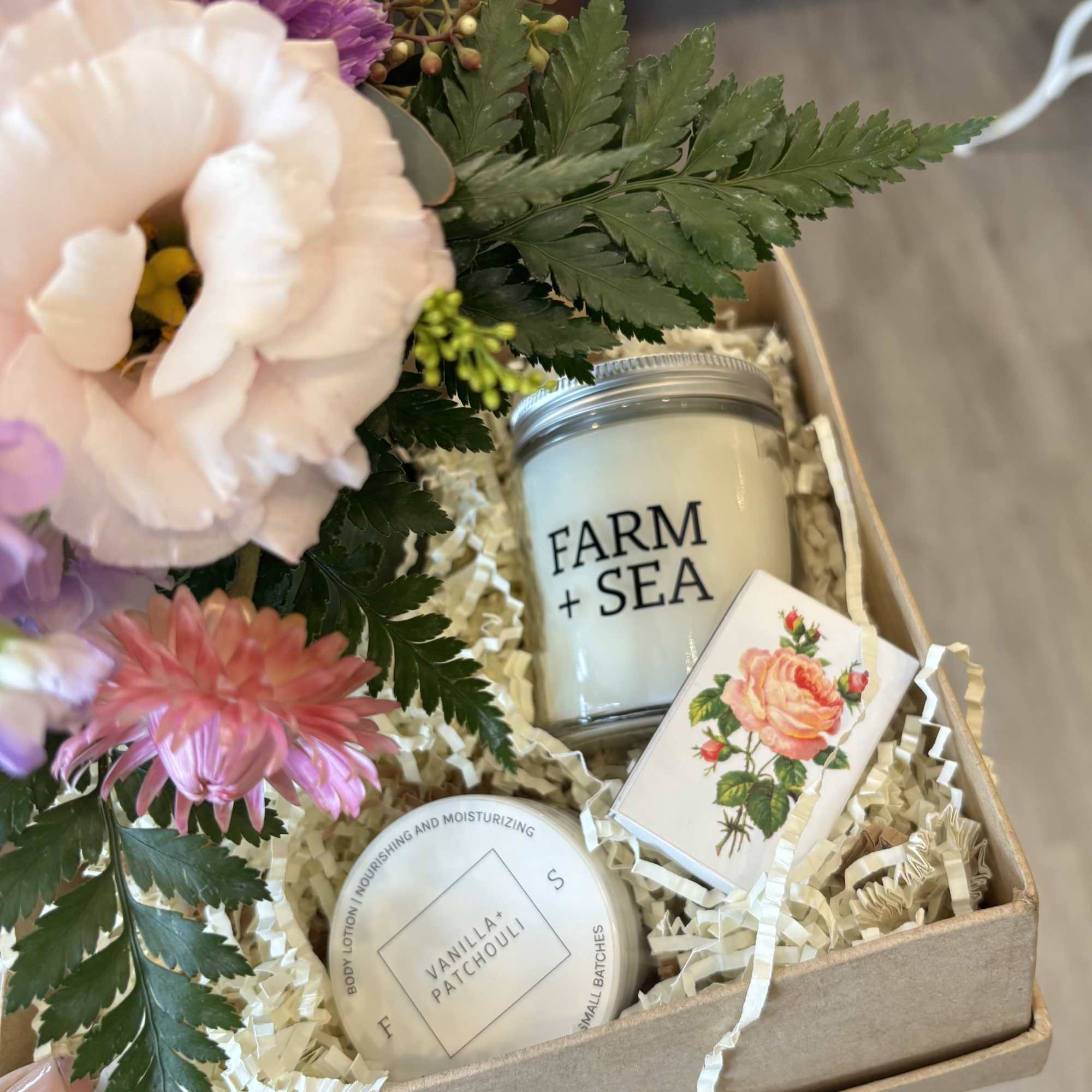 Our Farm + Sea Care Package includes a petite vase of flowers