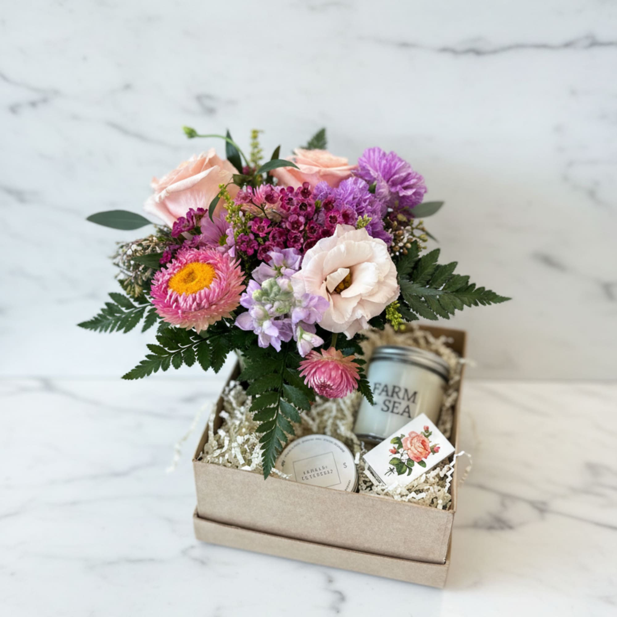 Our Farm + Sea Care Package includes a petite vase of flowers