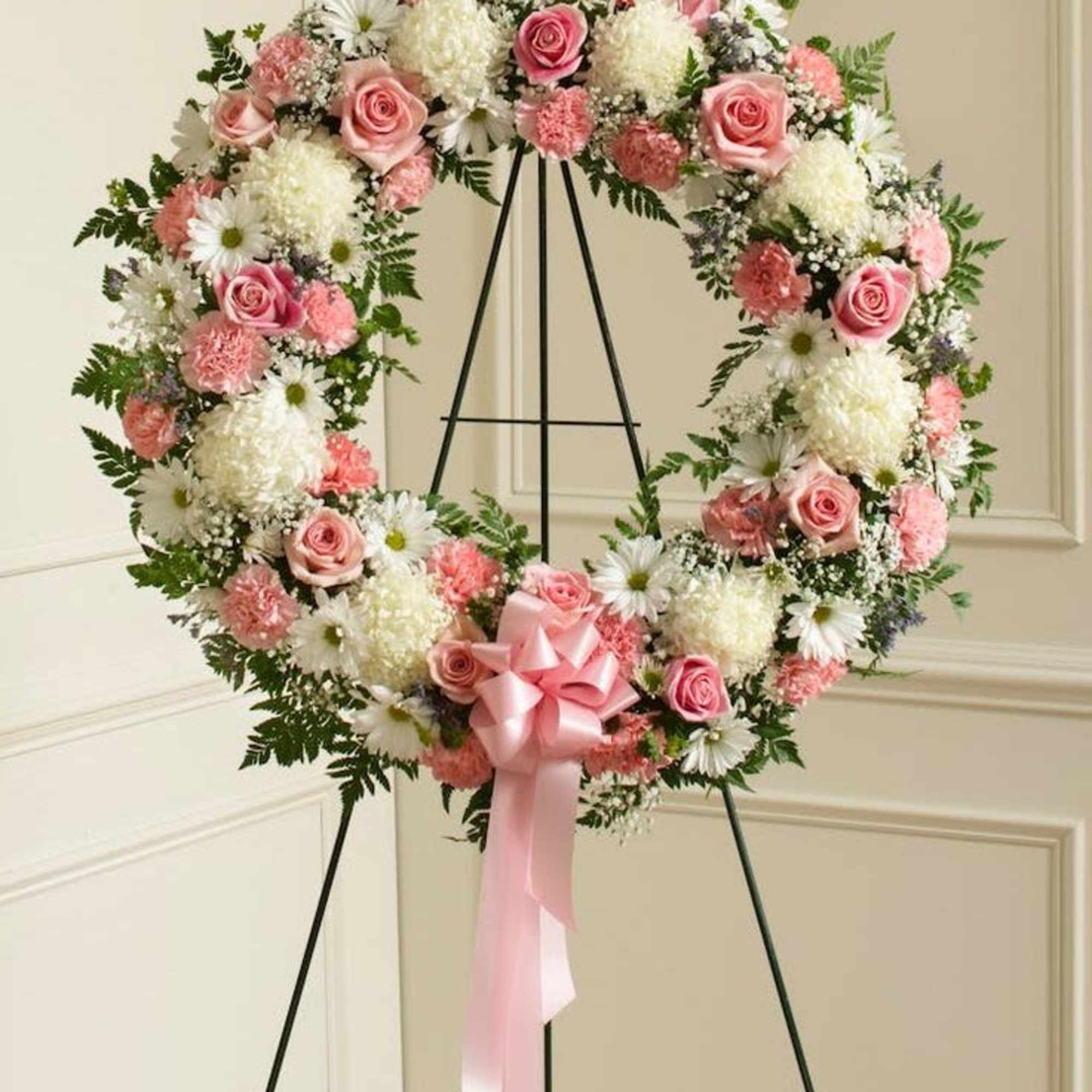 A soft circle of comfort, this standing sympathy wreath brings a quiet