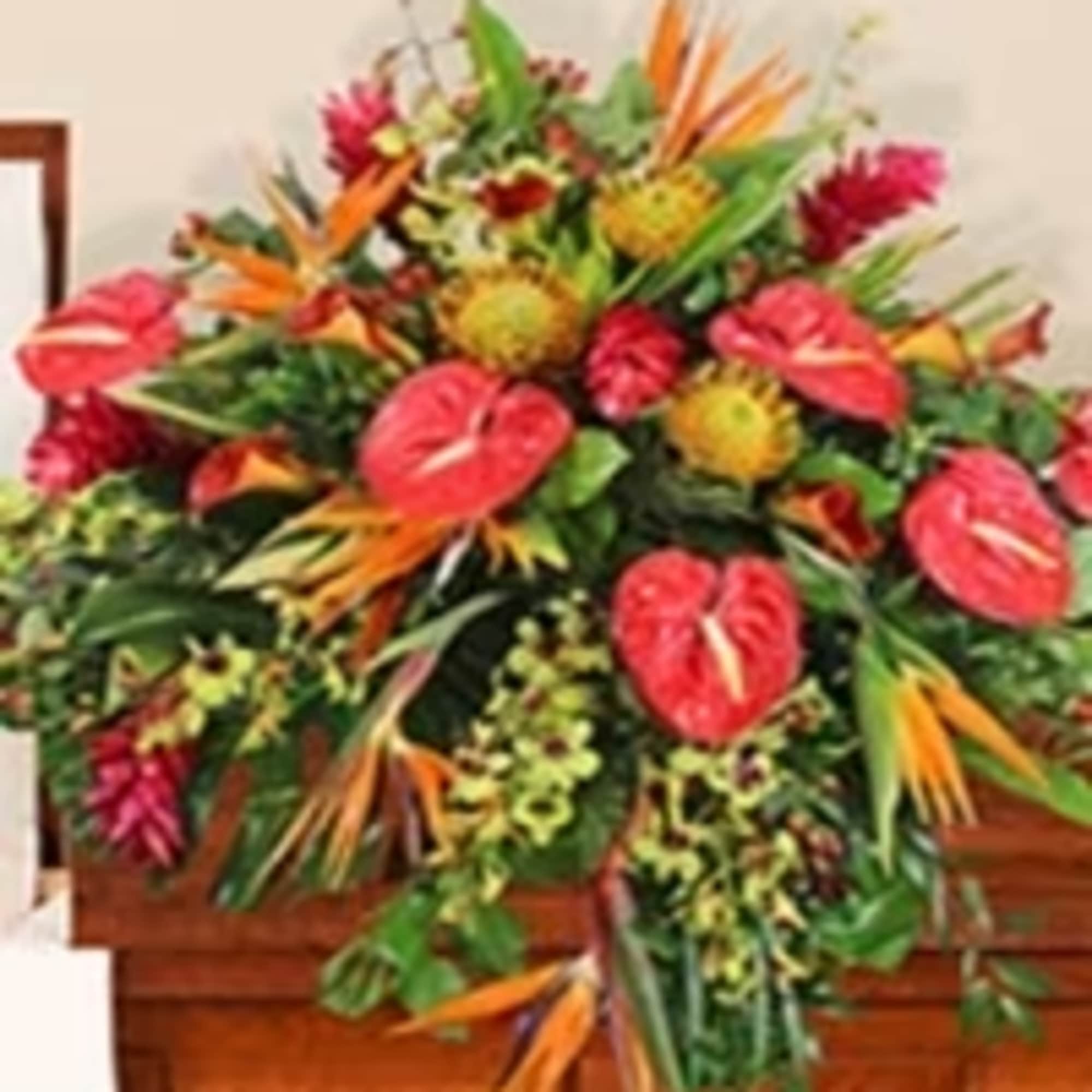 Bright, tropical blooms make a bold, life-affirming statement in this paradise casket