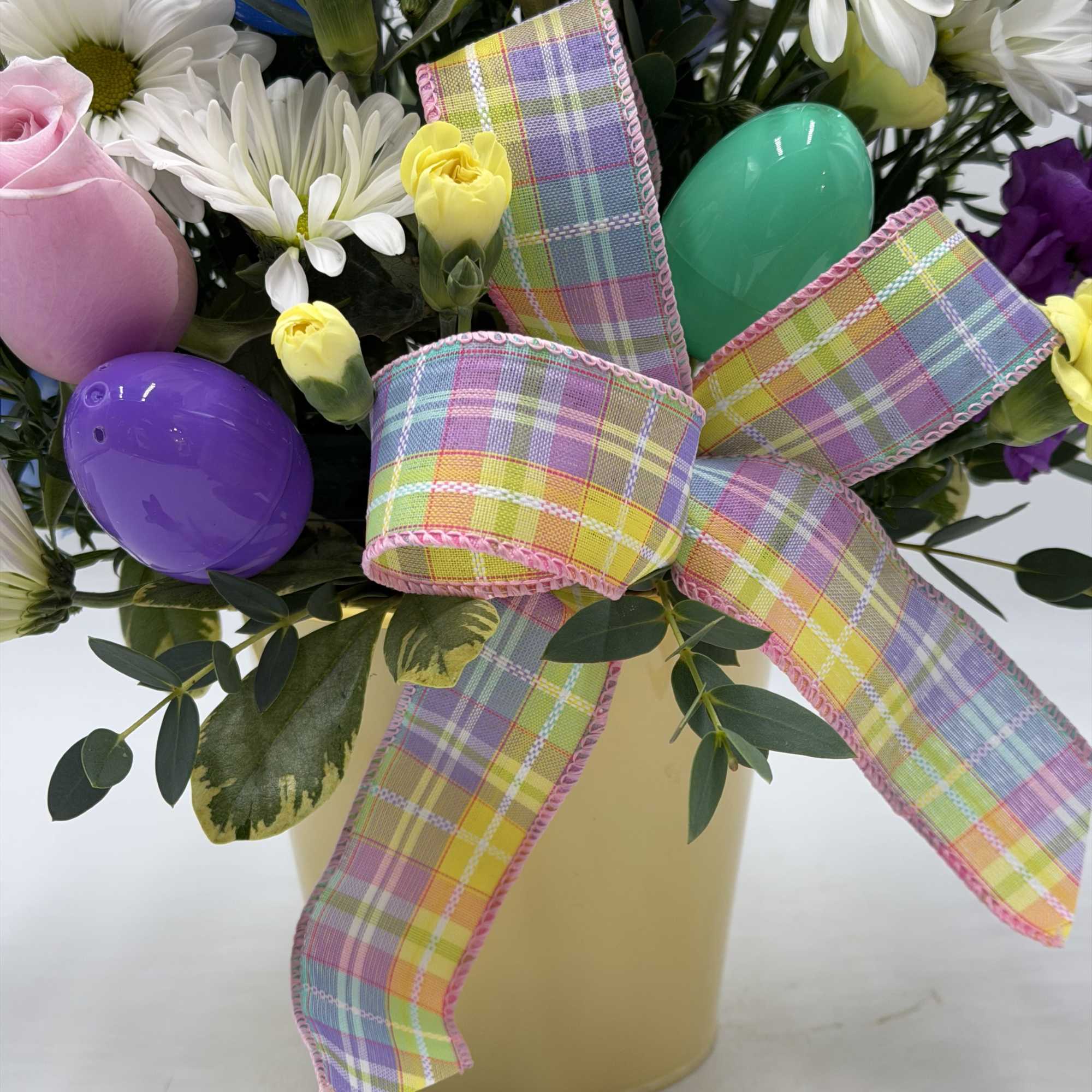 This garden-inspired arrangement bursts with fresh color and playful charm. Perfect for