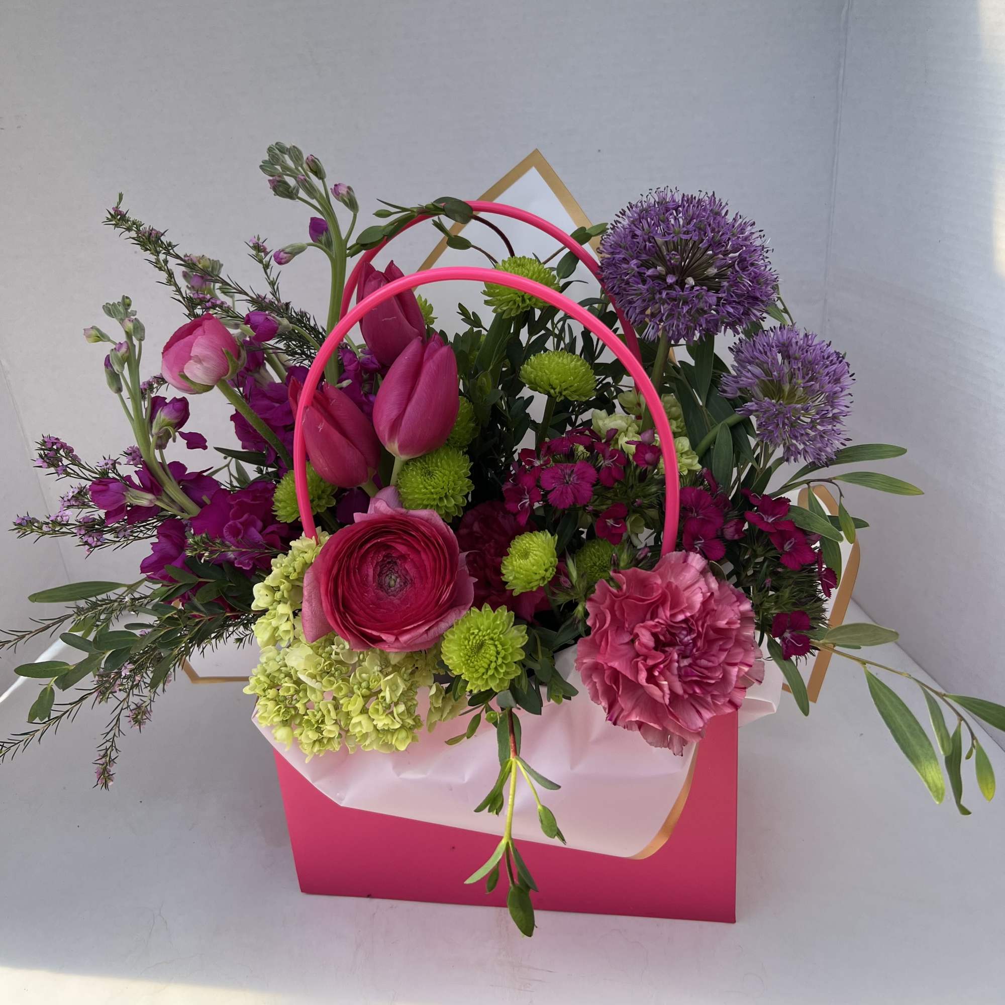 Our Blooming Baglet Purses are thoughtfully designed arrangements, blending soft, feminine colors