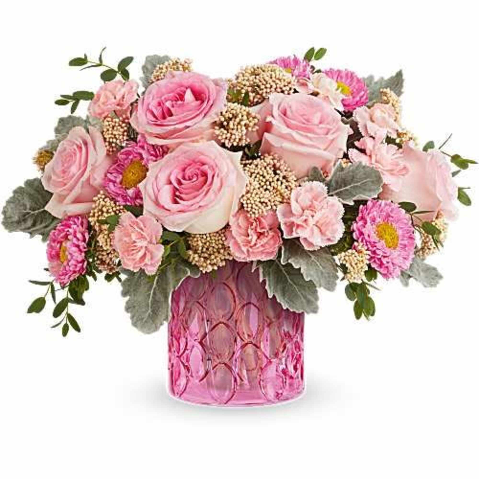 A soft cloud of blush and cream makes an immediate, romantic impression-this