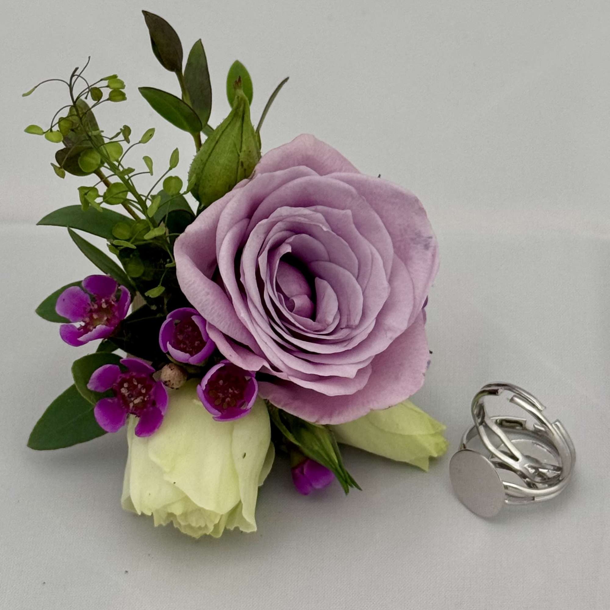 Floral Corsage Rings are a modern, stylish alternative to traditional wrist corsages.