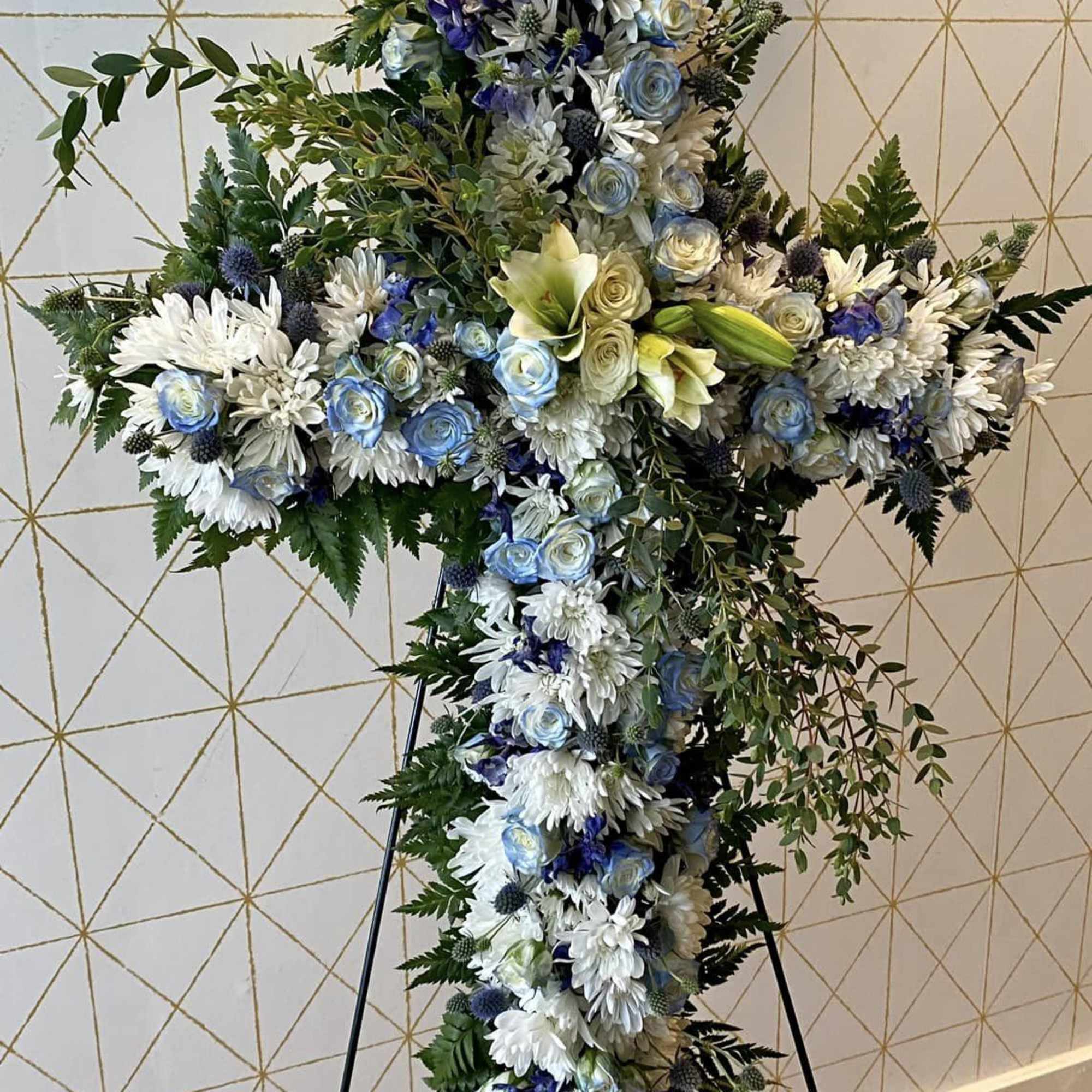 Our Cross Shape Easel is fully customizable in colors and flowers. Cross