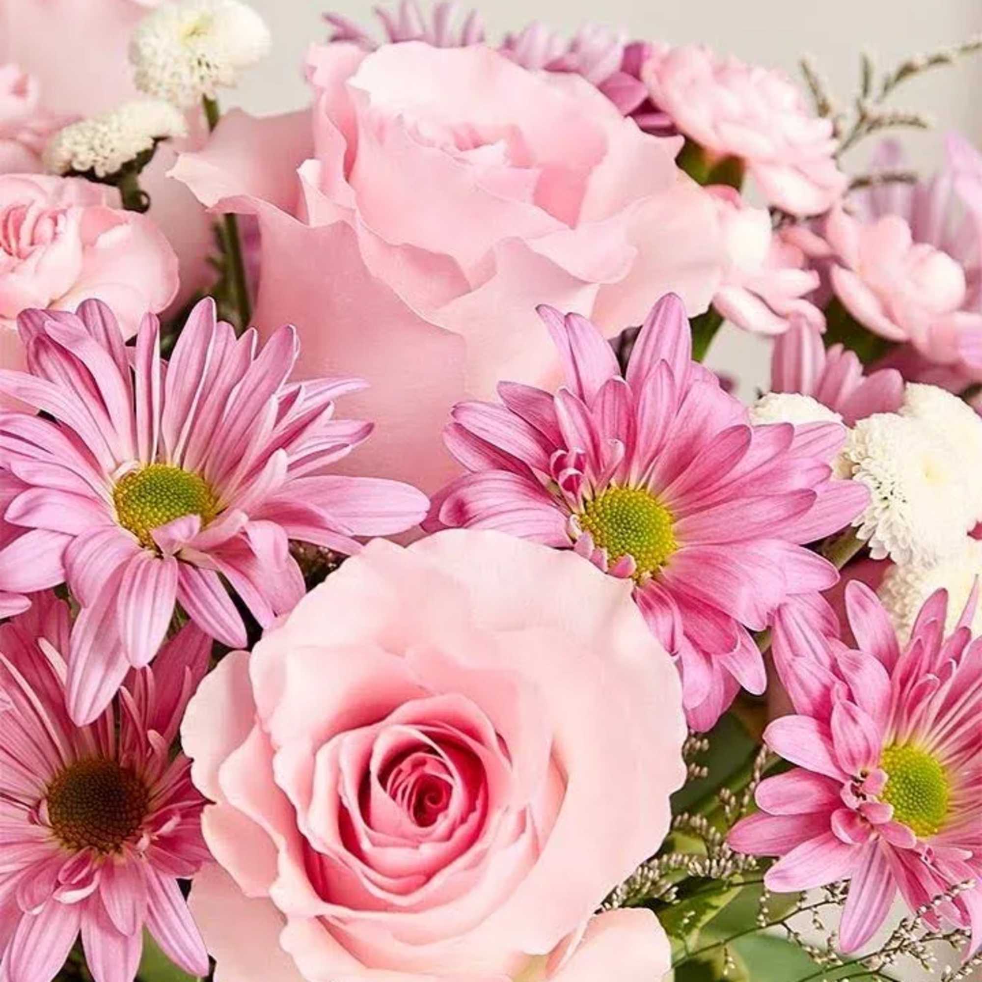 NEW The ultimate arrangement for your favorite fashionista. A profusion of roses