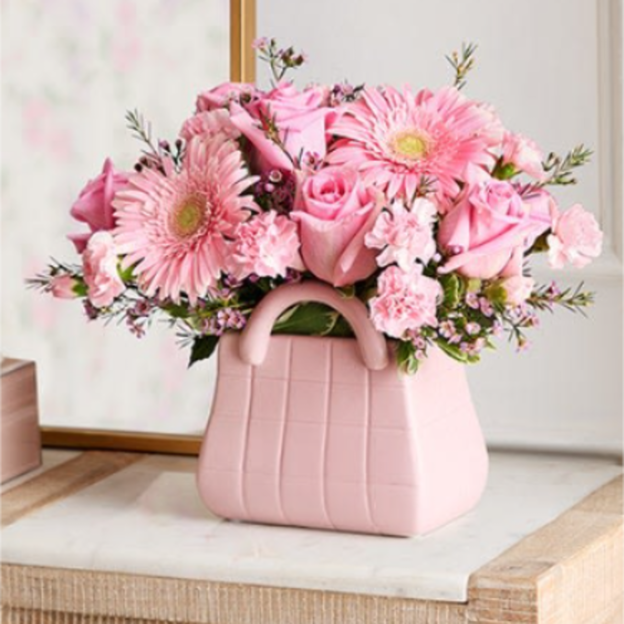 NEW The ultimate arrangement for your favorite fashionista. A profusion of roses