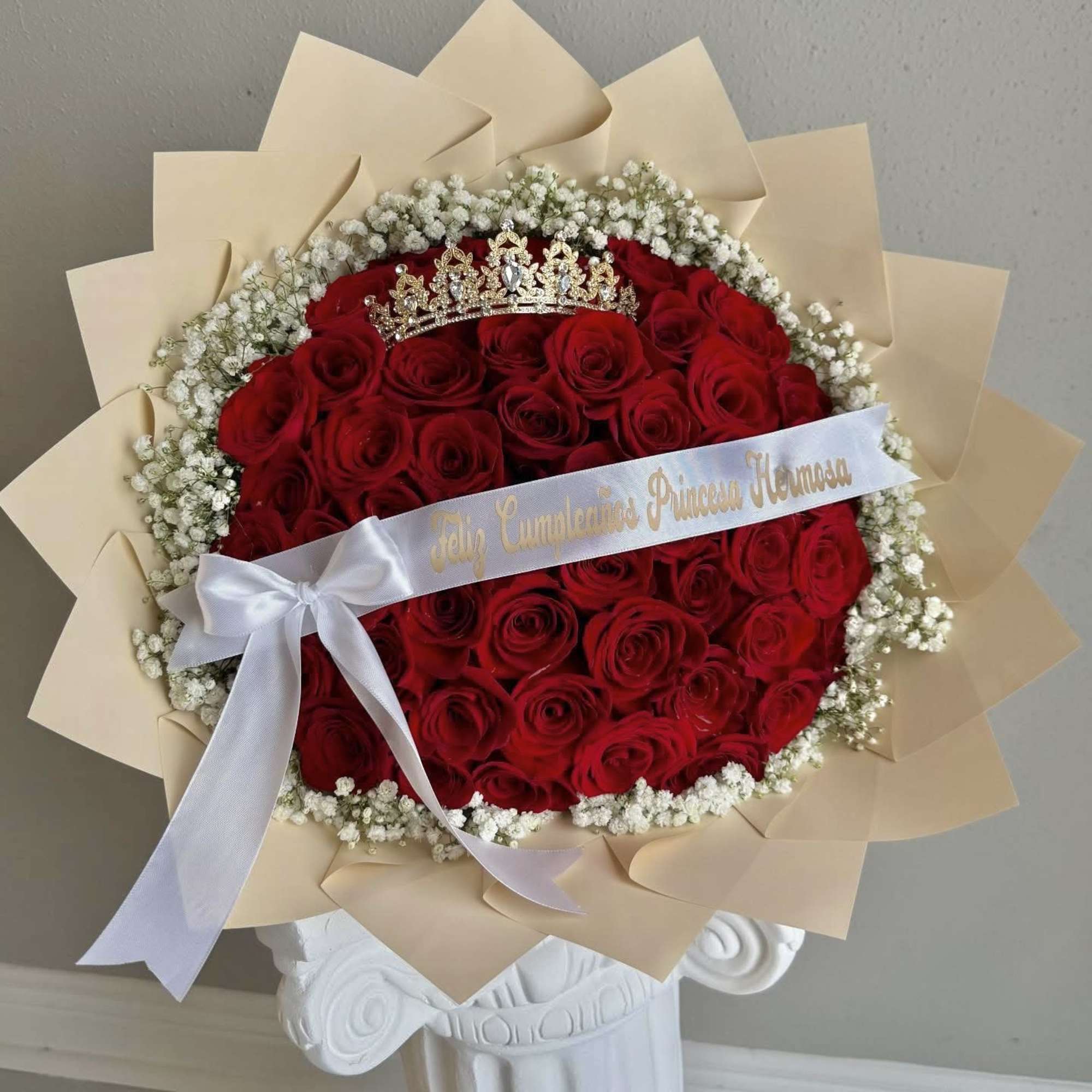 Celebrate her special day with our Royal  Rose Crown Bouquet, an