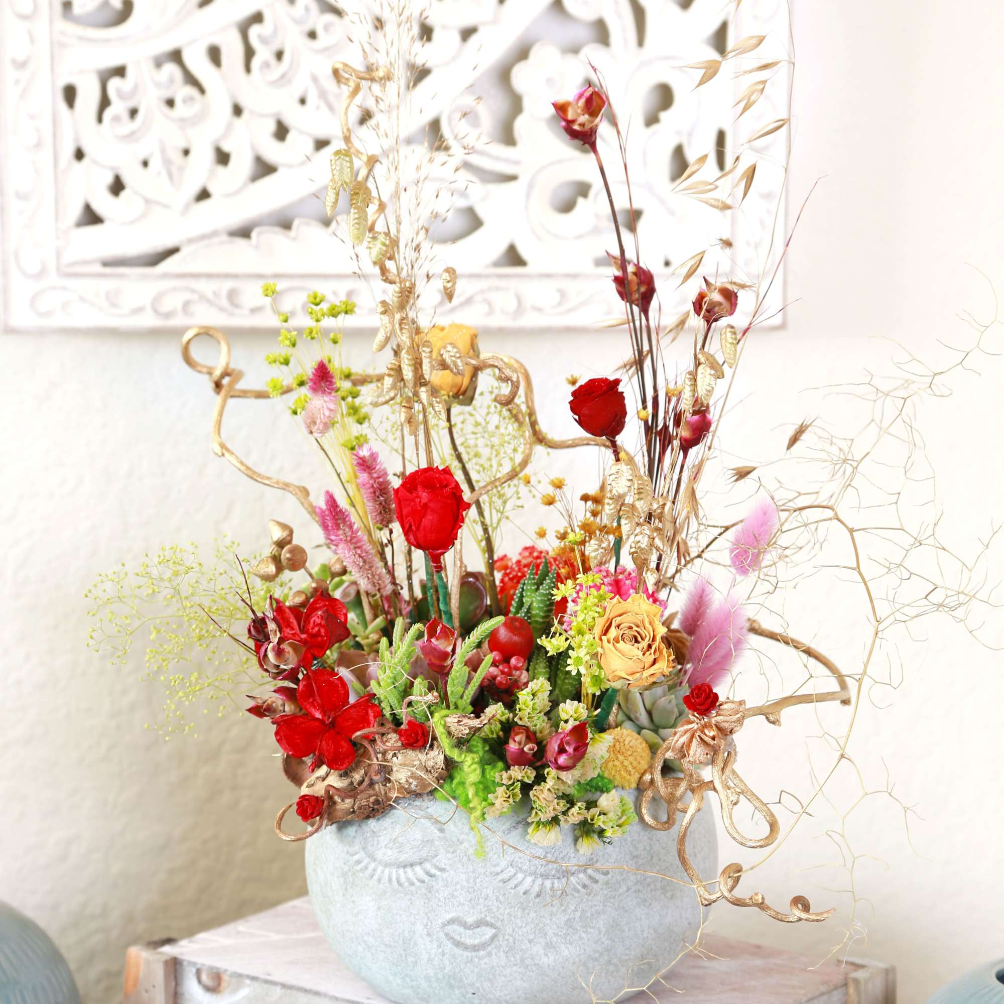 Our bestselling Assorted Succulent arranged in 7" Smile face ceramic seafoam color