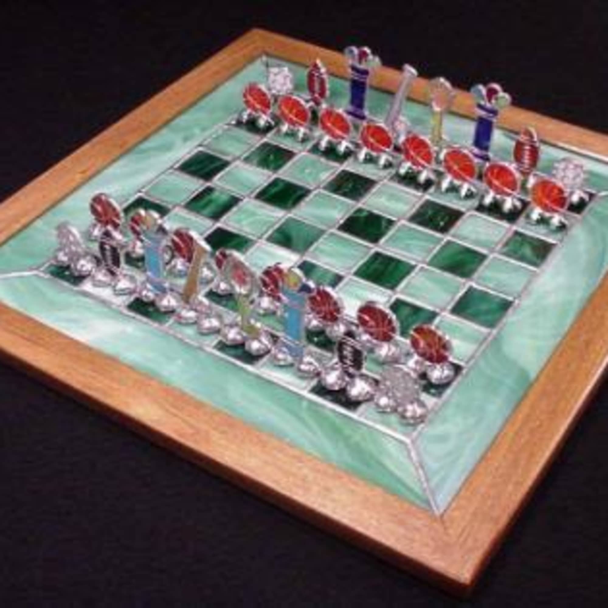 A jewel-like decorative chess set that reads as art as much as