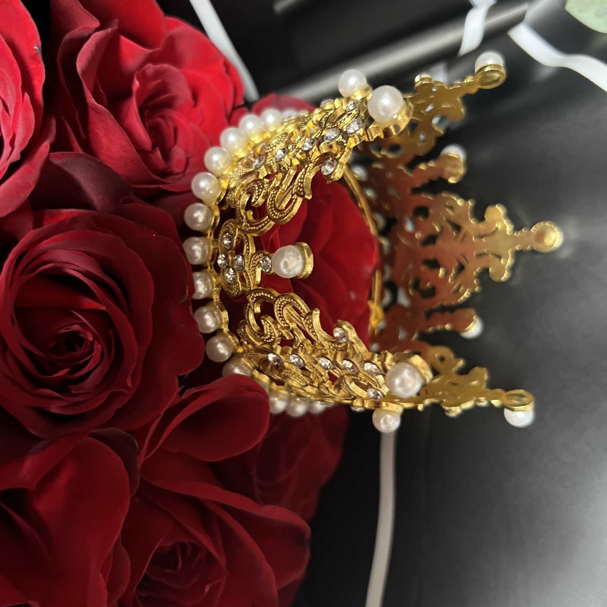 This Stunning  Wrapped Hand Held Rose Arrangement is fit for &ldquo;THE