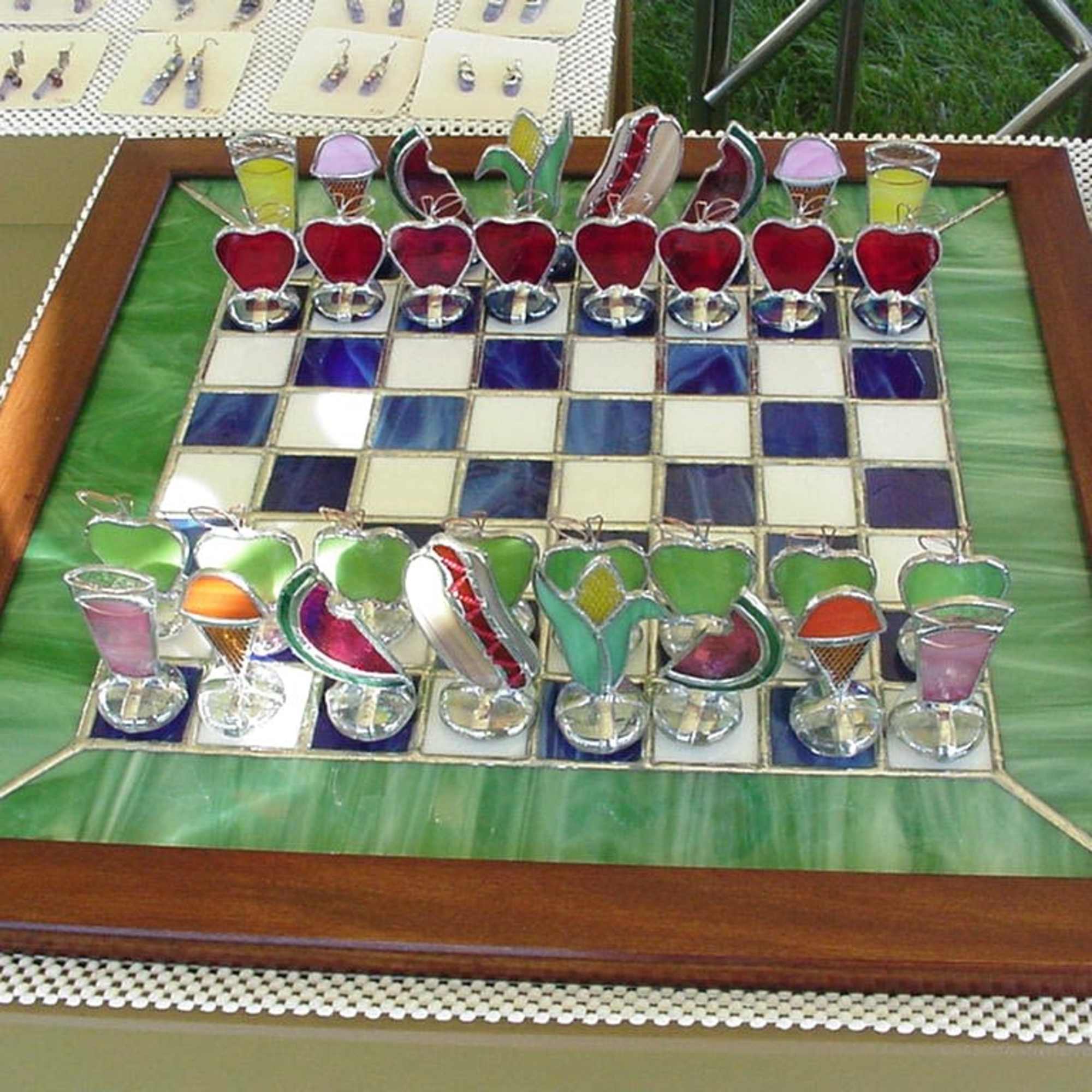 A sunny burst of color and whimsy, this one-of-a-kind stained-glass Summer Picnic