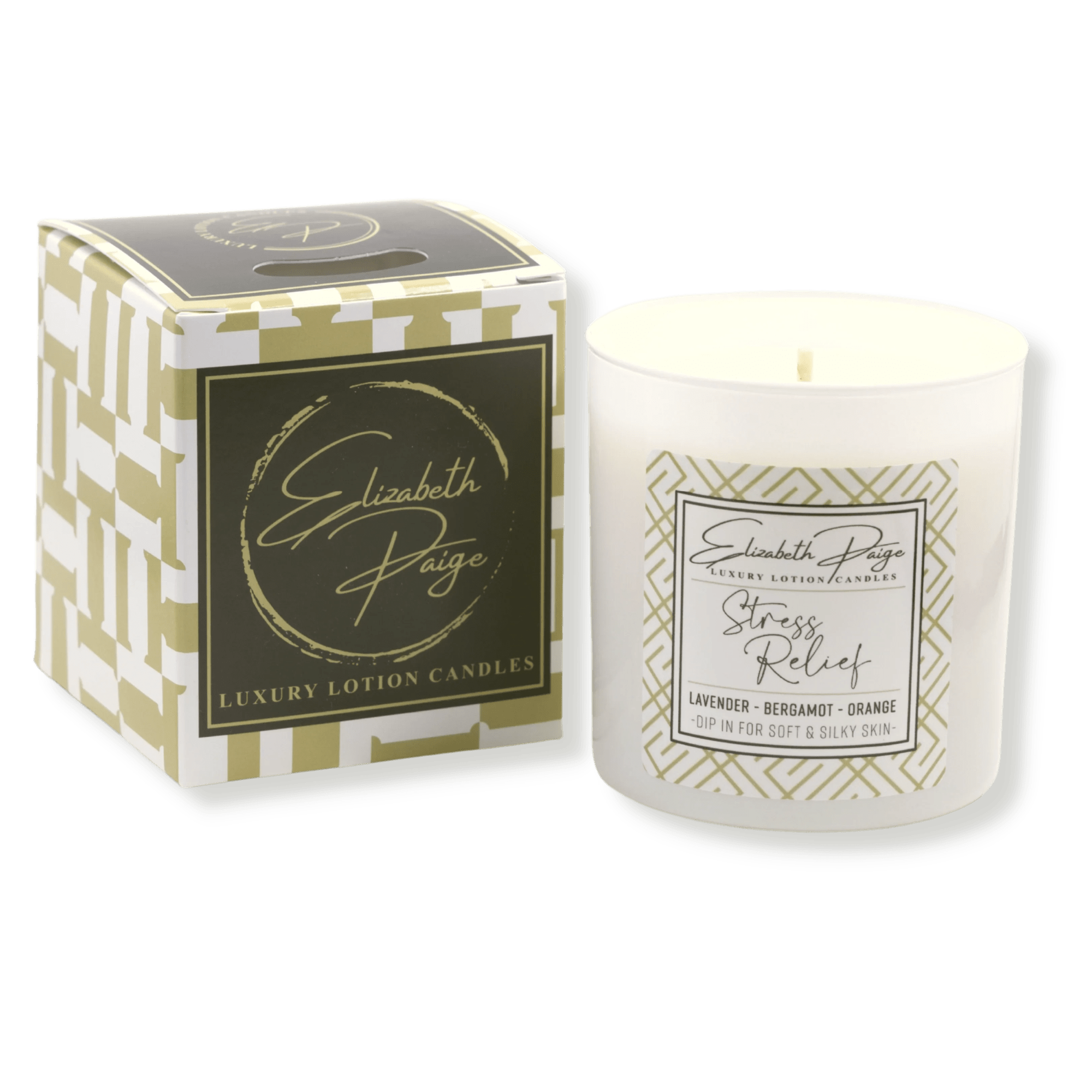 White candle in a glass jar with matching patterned box beside it
