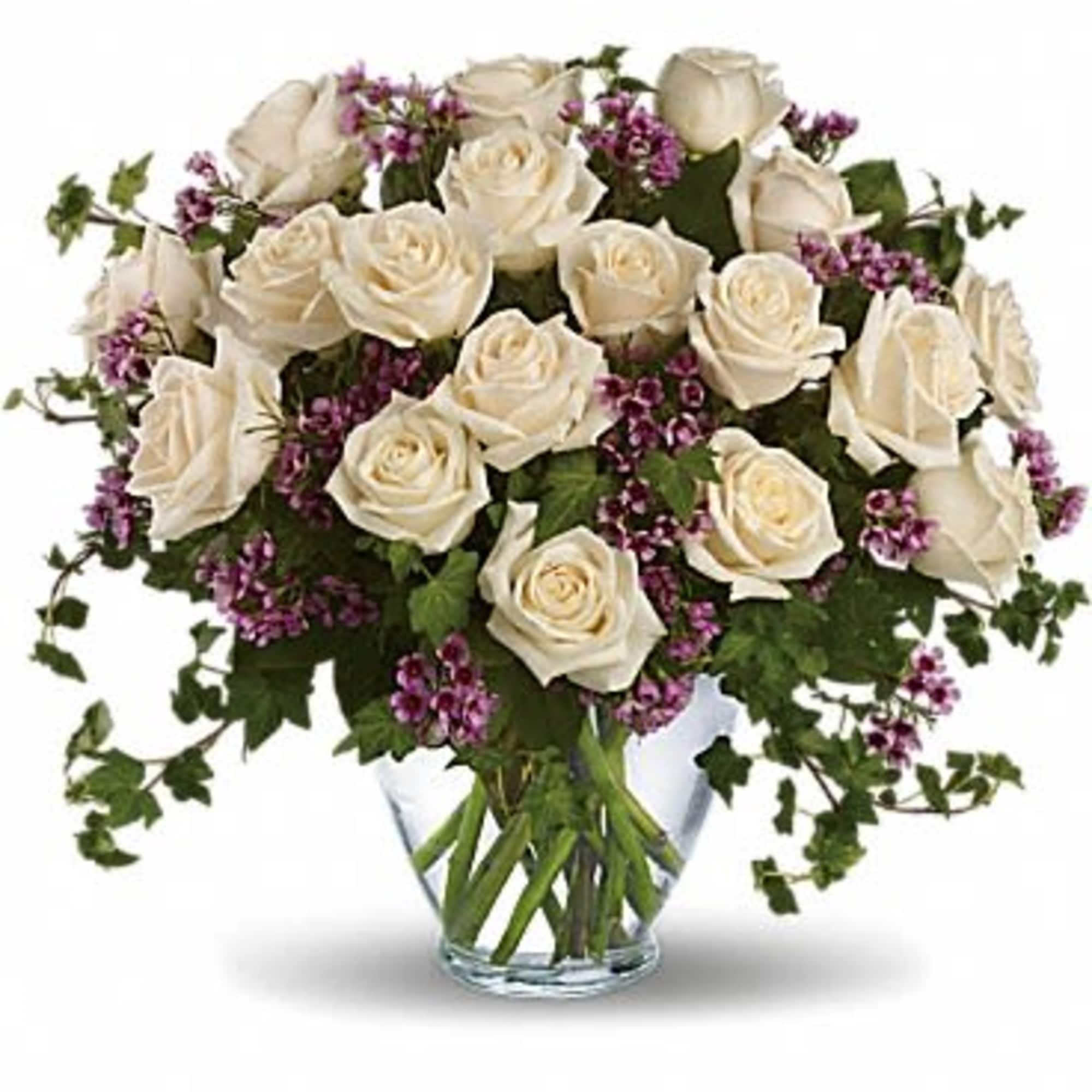 Romance blossoms beautifully within this elegant bouquet. The serenity and innocence of