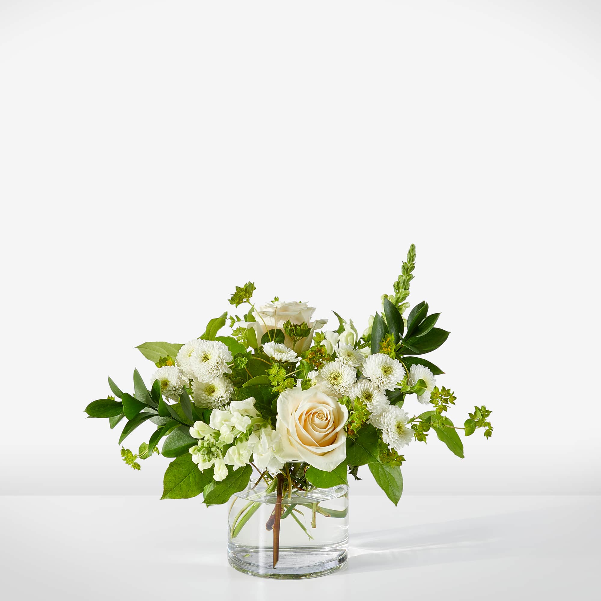 A sweet treat in the form of creamy, white florals and greenery.