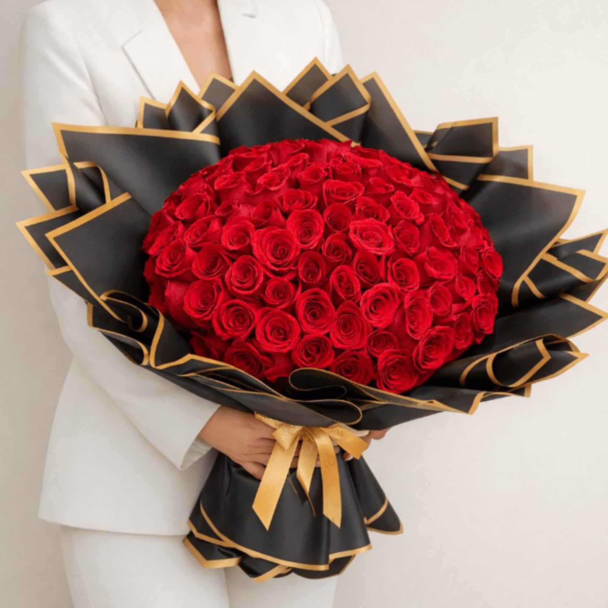 An oversized dome of vivid red roses makes an immediate statement-this rose