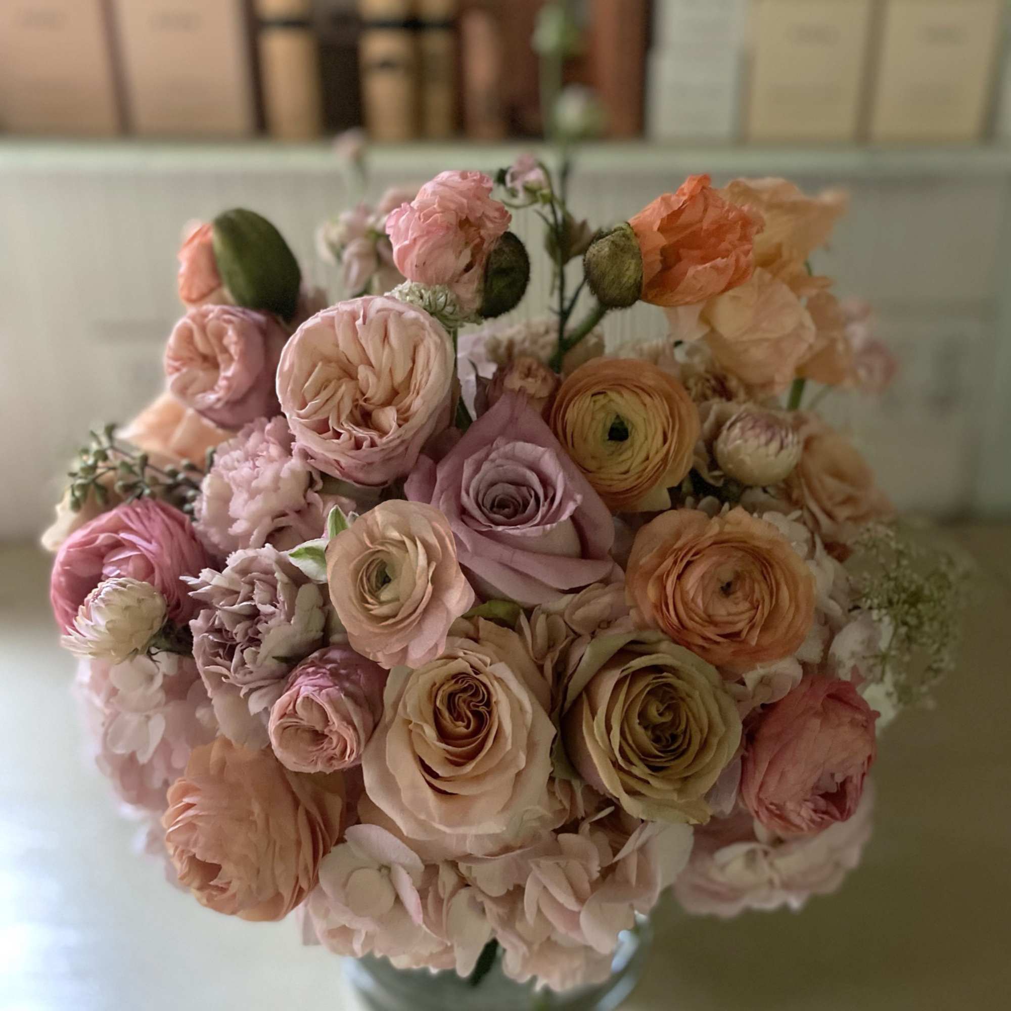 Sunset colors of orange, brown, coral, mustard and golden pastels adorn this