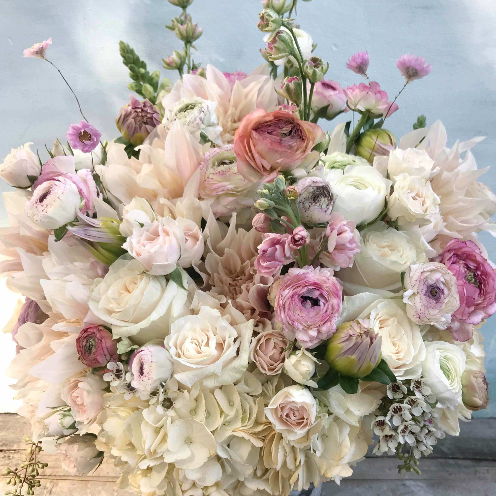 Extravagant yet bohemian large arrangement of powder pastel colors and feminine, soft