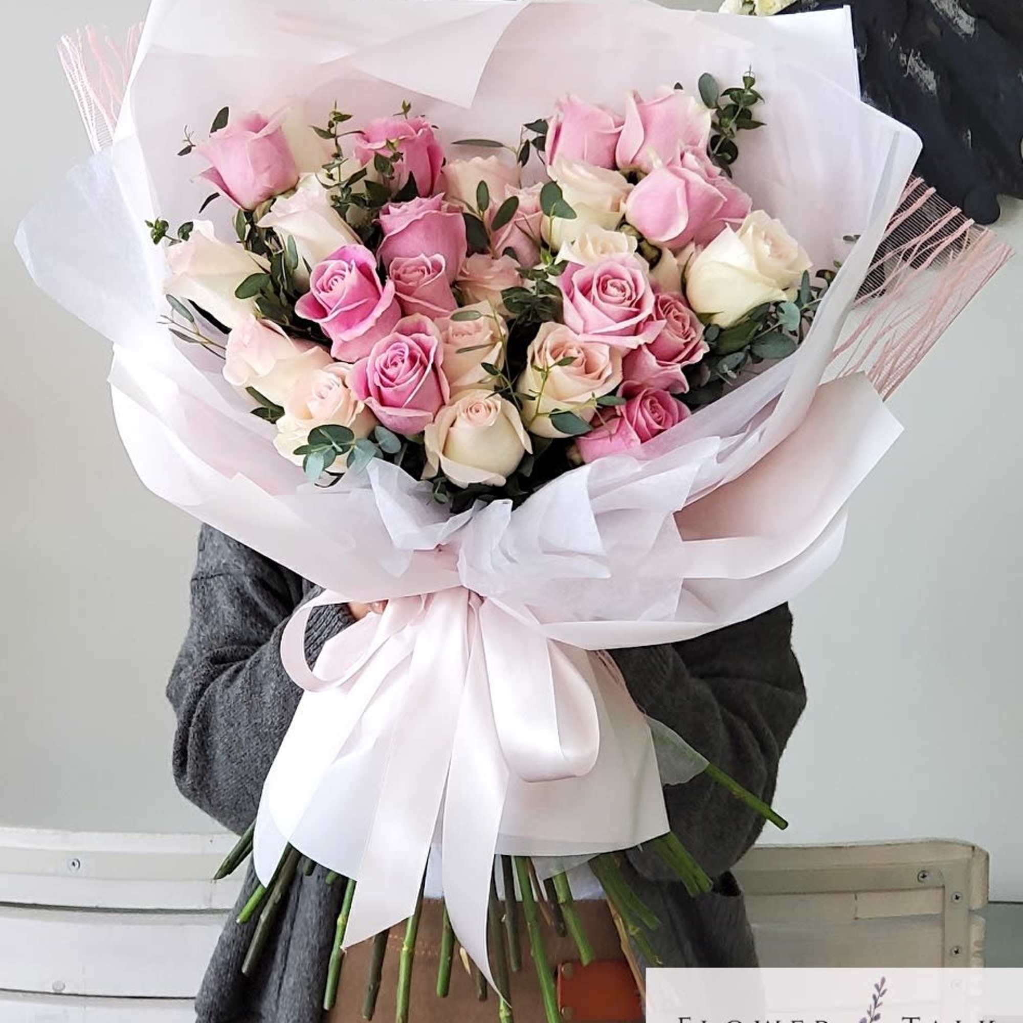 This bouquet is an extravagant display of pink and peachy roses! 

Note: